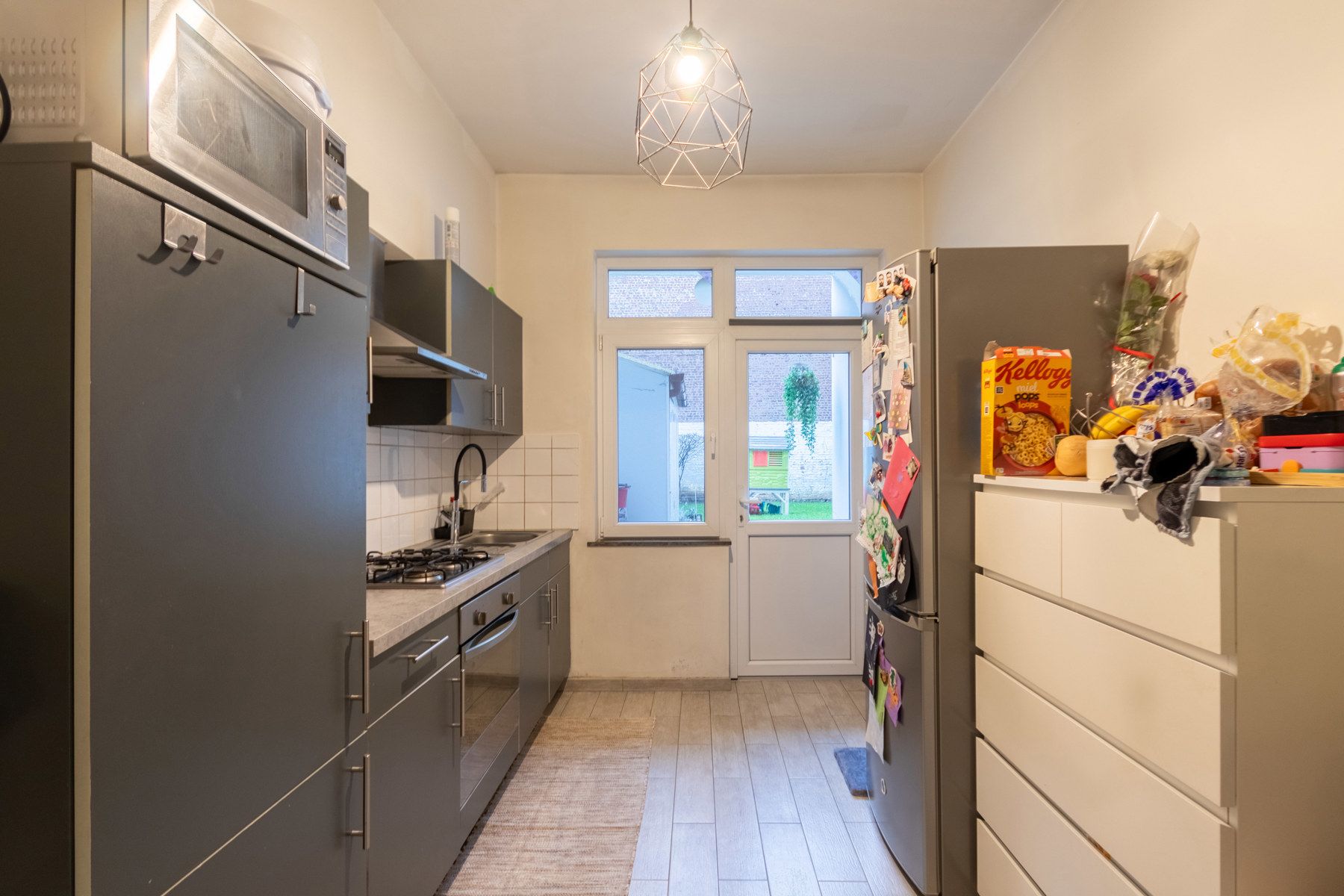 Gelijkvloers appartement met terras en tuin foto 12