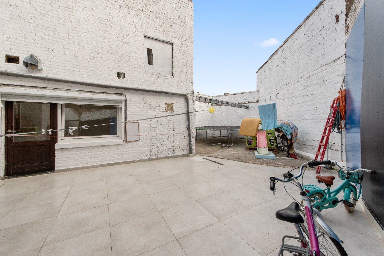 Polyvalente rijwoning met grote handelsruimte te Tienen foto 3