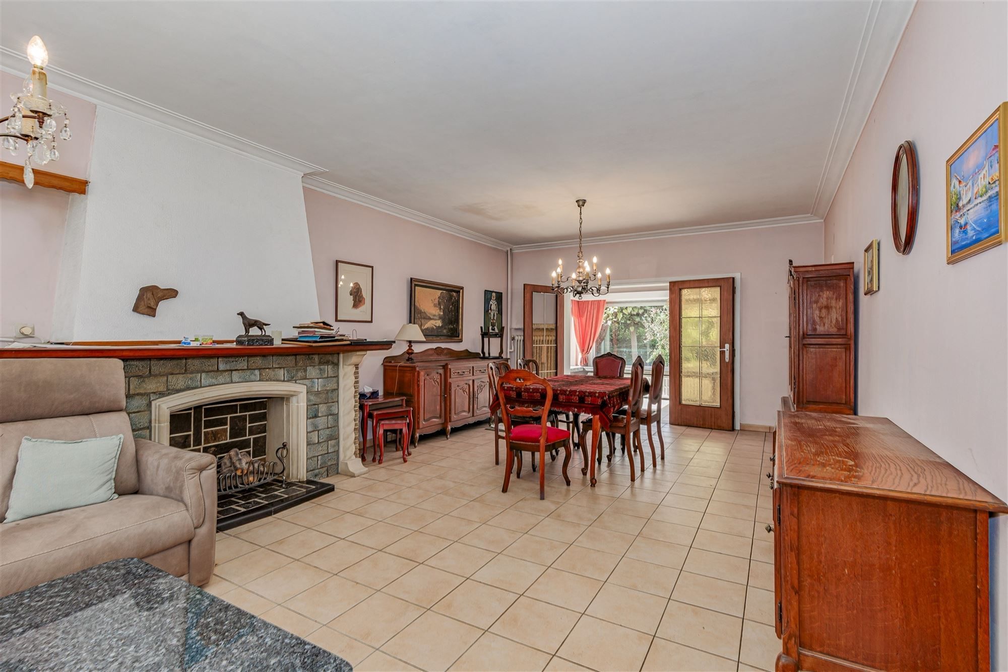 Te renoveren woning met 3 slpk, terras en ruime tuin in Wommelgem! foto 4