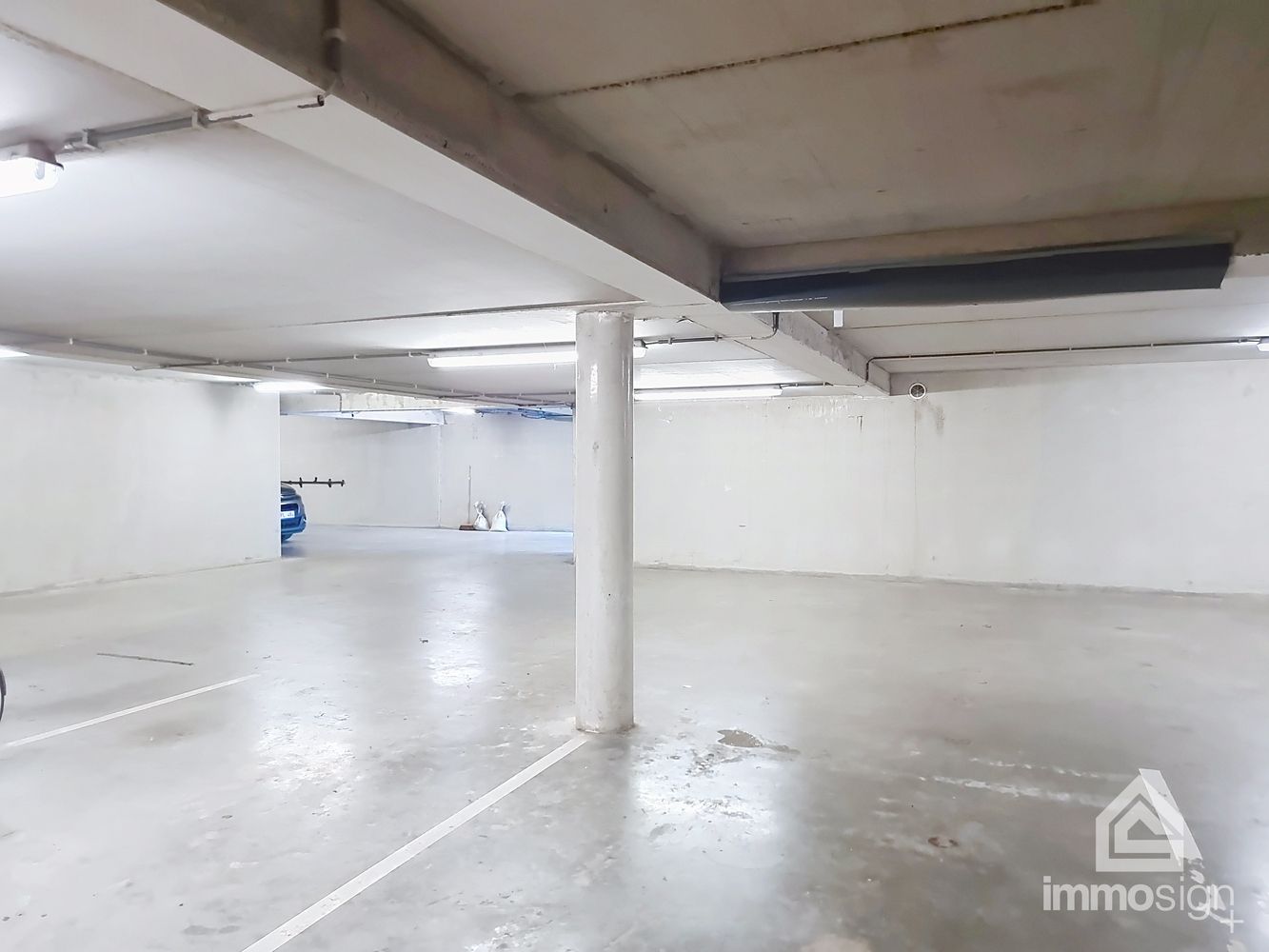 Ondergrondse autostaanplaats residentie Azzure te Bree foto {{pictureIndex}}