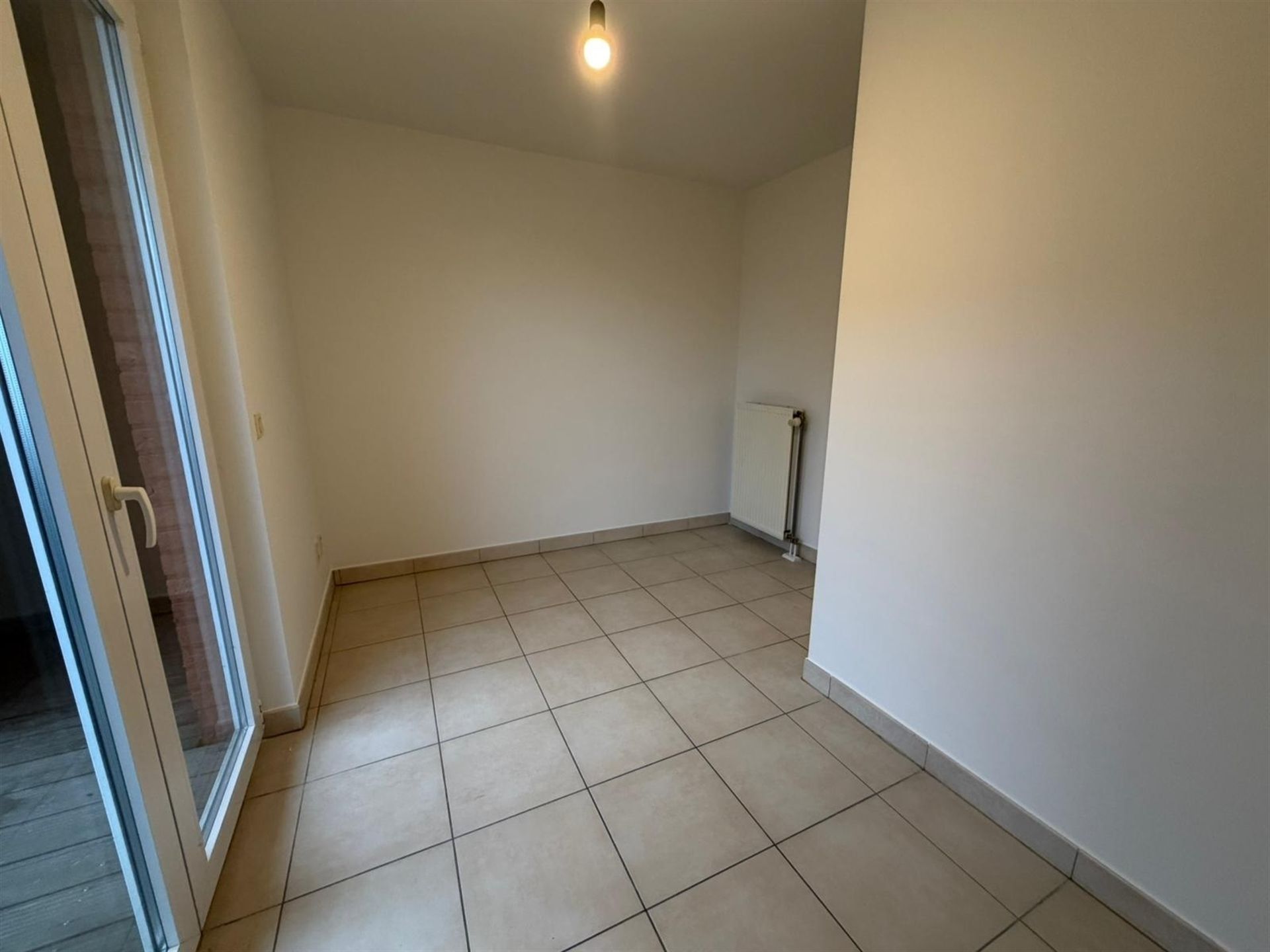 Duplex-appartement met extra zolderkamer + garagebox in het centrum! foto 12