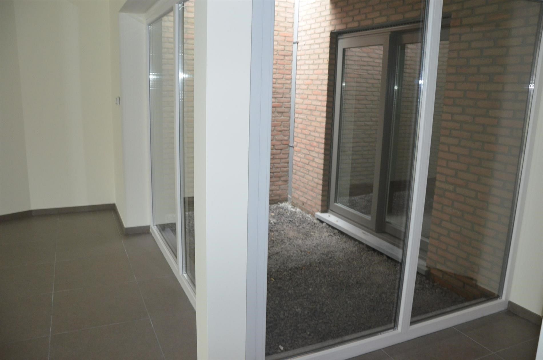 Recent appartement gelijkvloers. foto 3