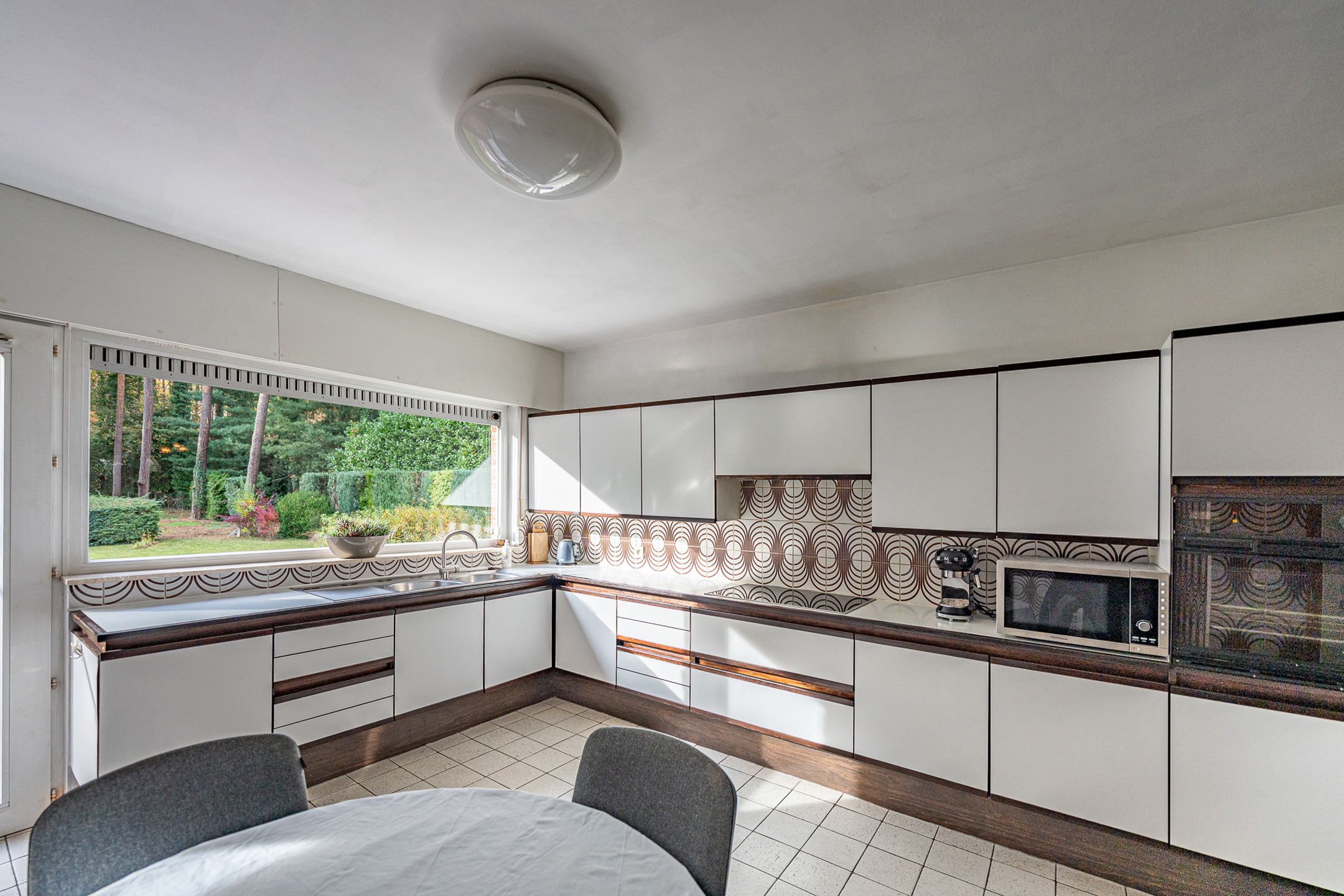 Ruime gezinswoning  in residentiële, groene omgeving foto 12