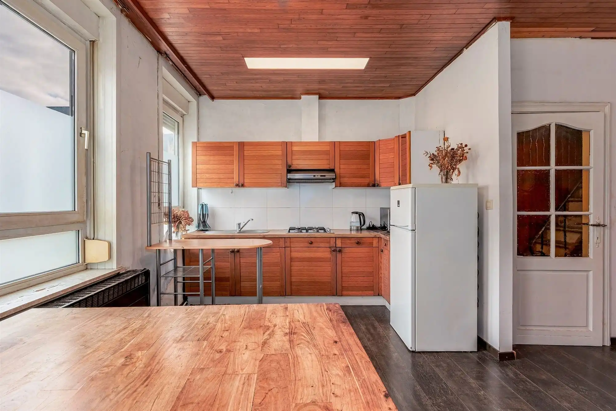 Bel-etagewoning met 2 slaapkamers en ruime garage foto 2