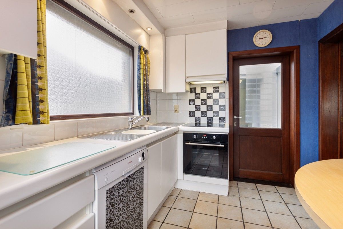 Ruime woning met handelspand in hartje van Sleidinge foto 4