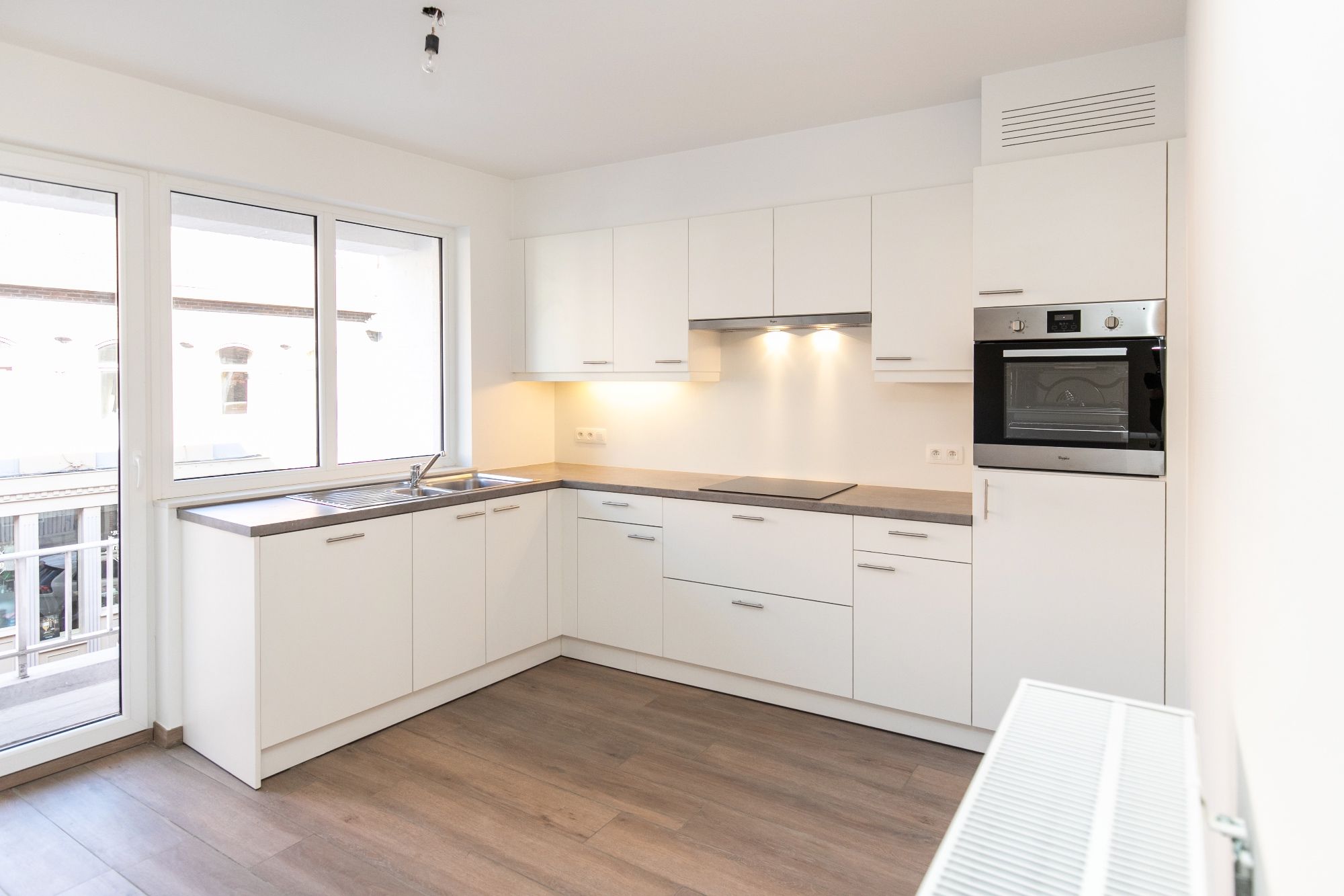 Ruim appartement met 2 slaapkamers in het centrum van Bilzen! foto 5