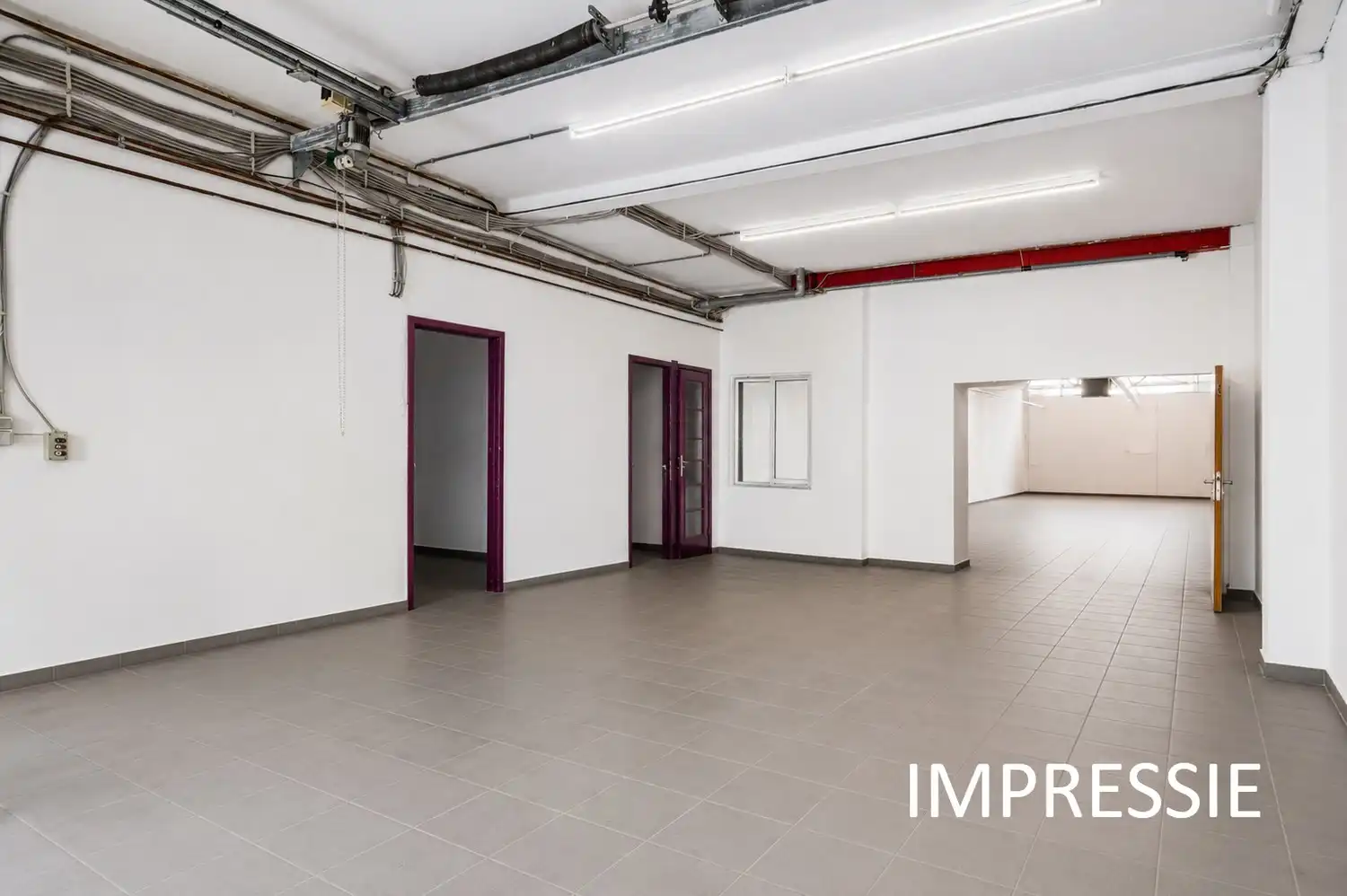 Riant magazijn (235m²) met woonst & terras centraal gelegen te Lier foto 2