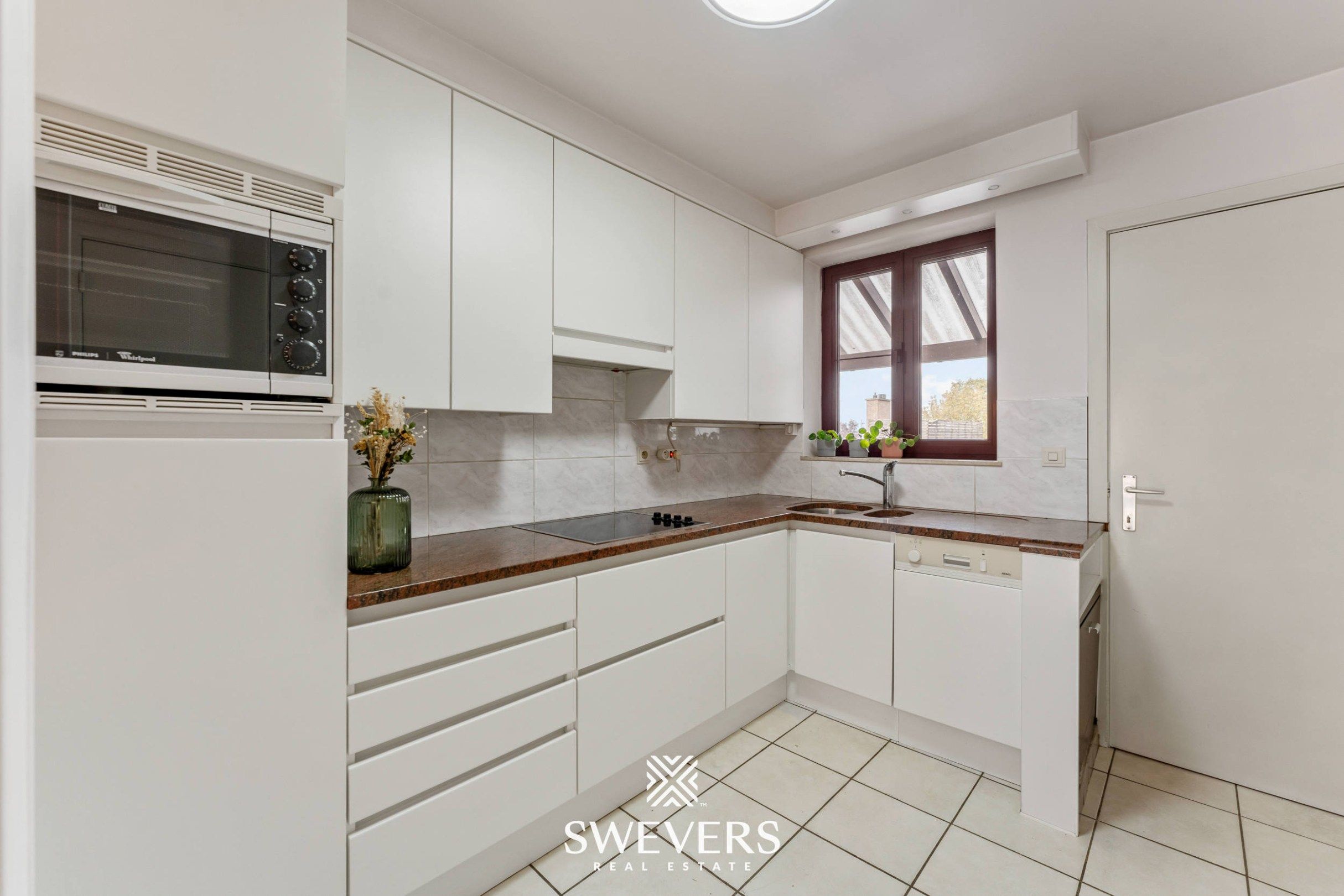 Instapklaar en lichtrijk duplexappartement in centrum Herk-de-Stad foto 18
