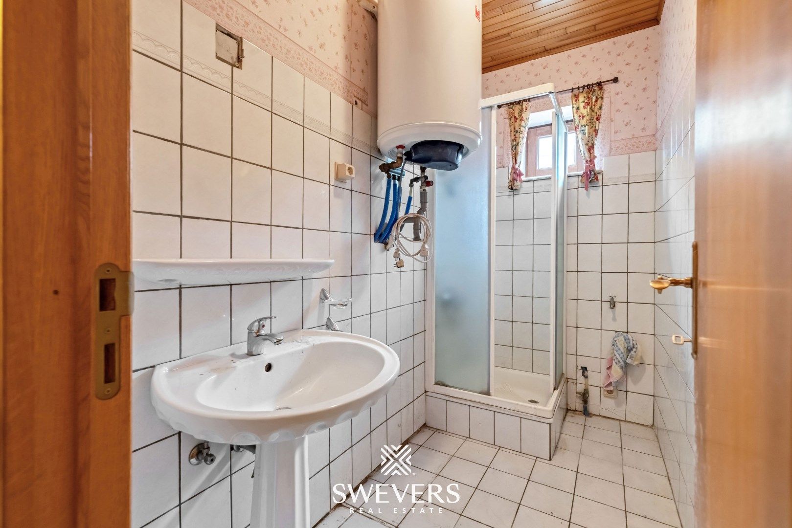Karaktervolle woonst met renovatiepotentieel te Beverlo foto 16