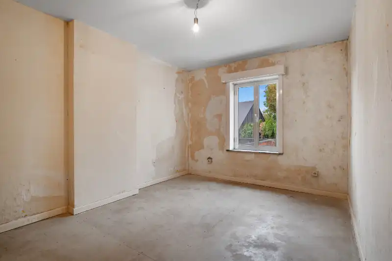Te renoveren starterswoning met 2/3 slaapkamers en tuinjte foto 11