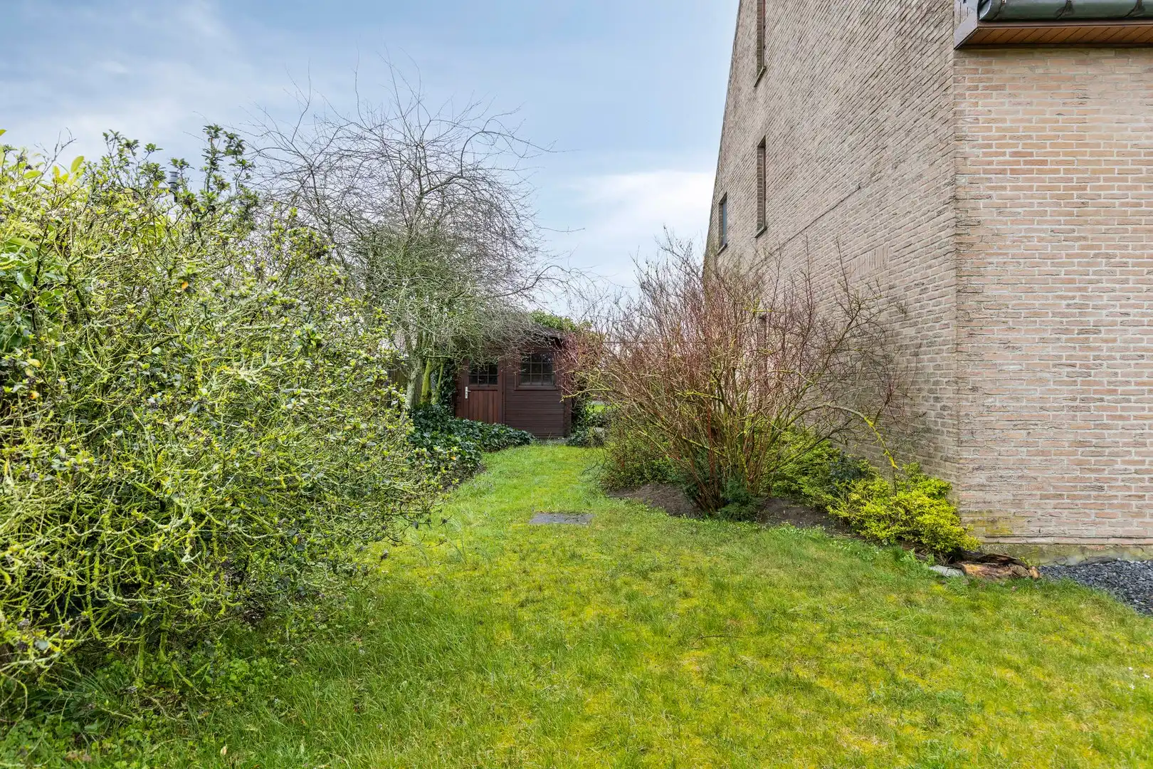 Ruim gelijkvloers appartement met grote tuin in een residentiële wijk ! foto 32