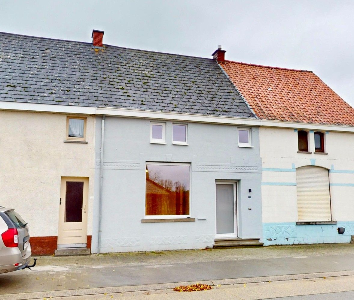 Mooie gerenoveerde woning met ontsluiting naar achter in centrum Zingem! foto 2