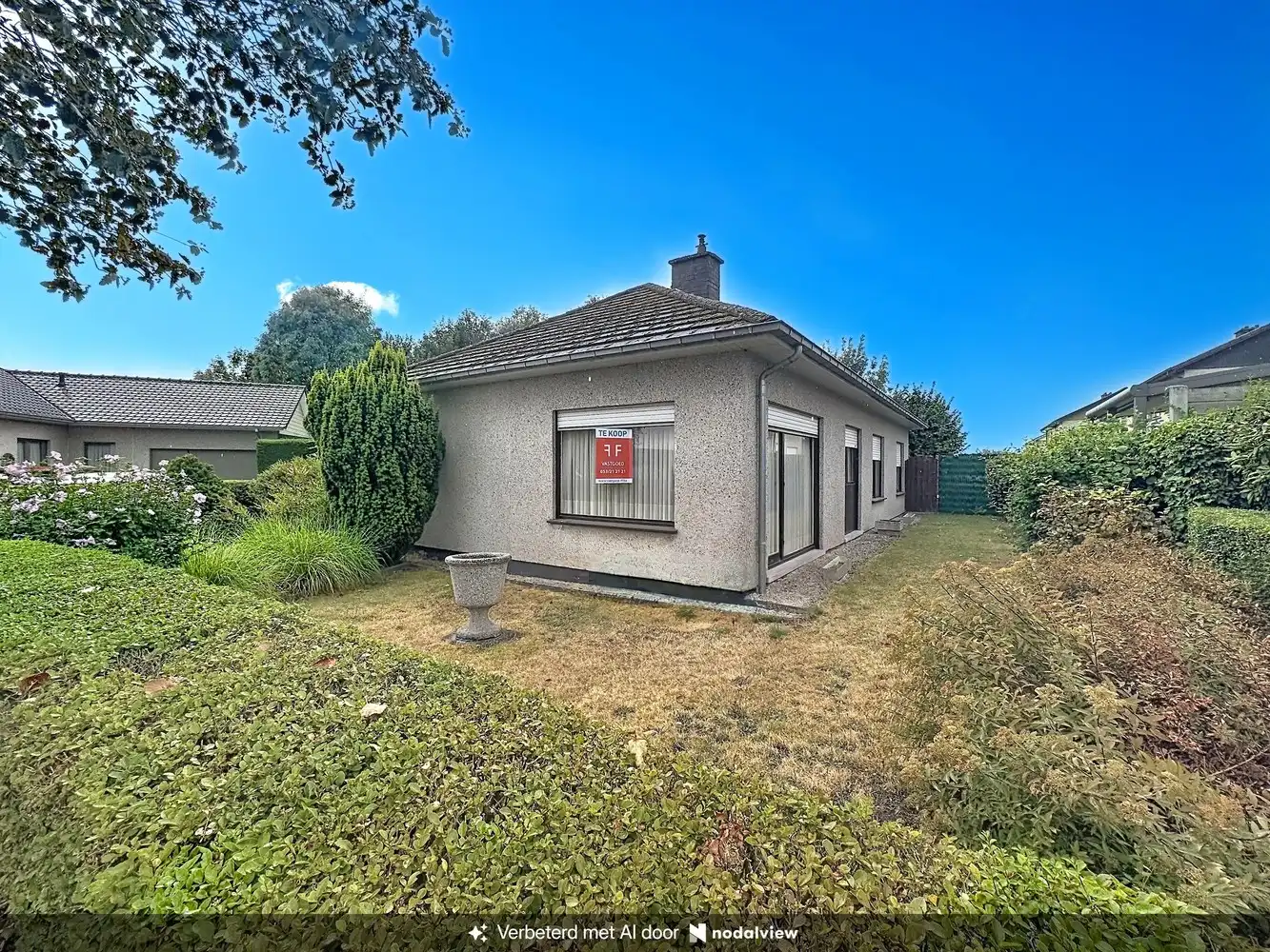 Vrijstaande bungalow met 3 slaapkamers en inpandige garage te Sint-Lievens-Houtem foto 2