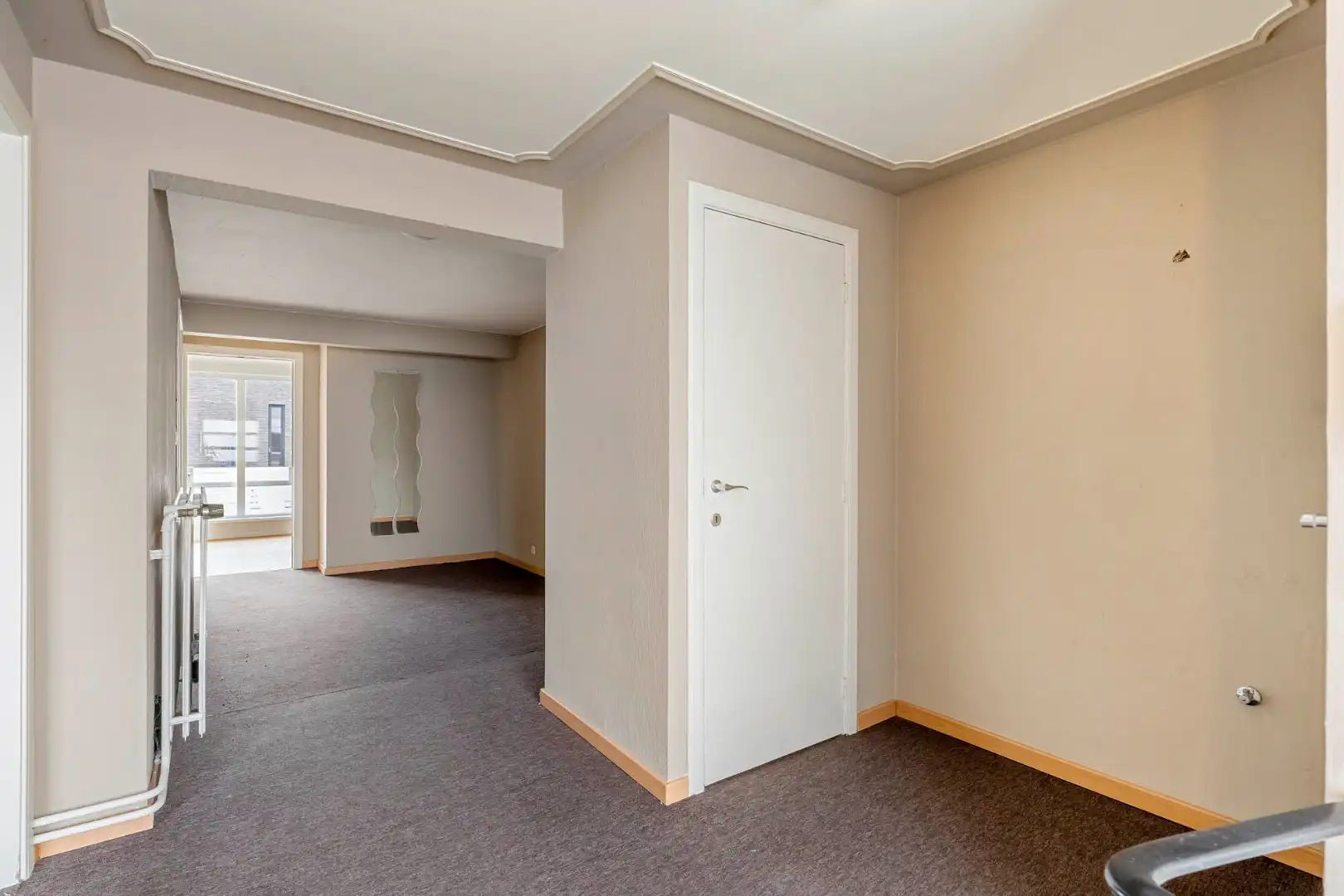 Comfortabel, zeer ruim appartement met 4 slaapkamers, terras en garage in het centrum van Neeroeteren!  foto 22