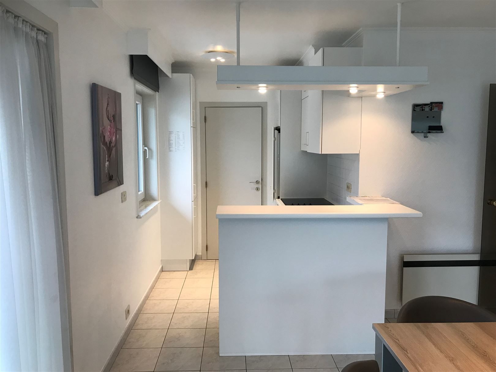 2 slaapkamerappartement te huur met garage foto 5