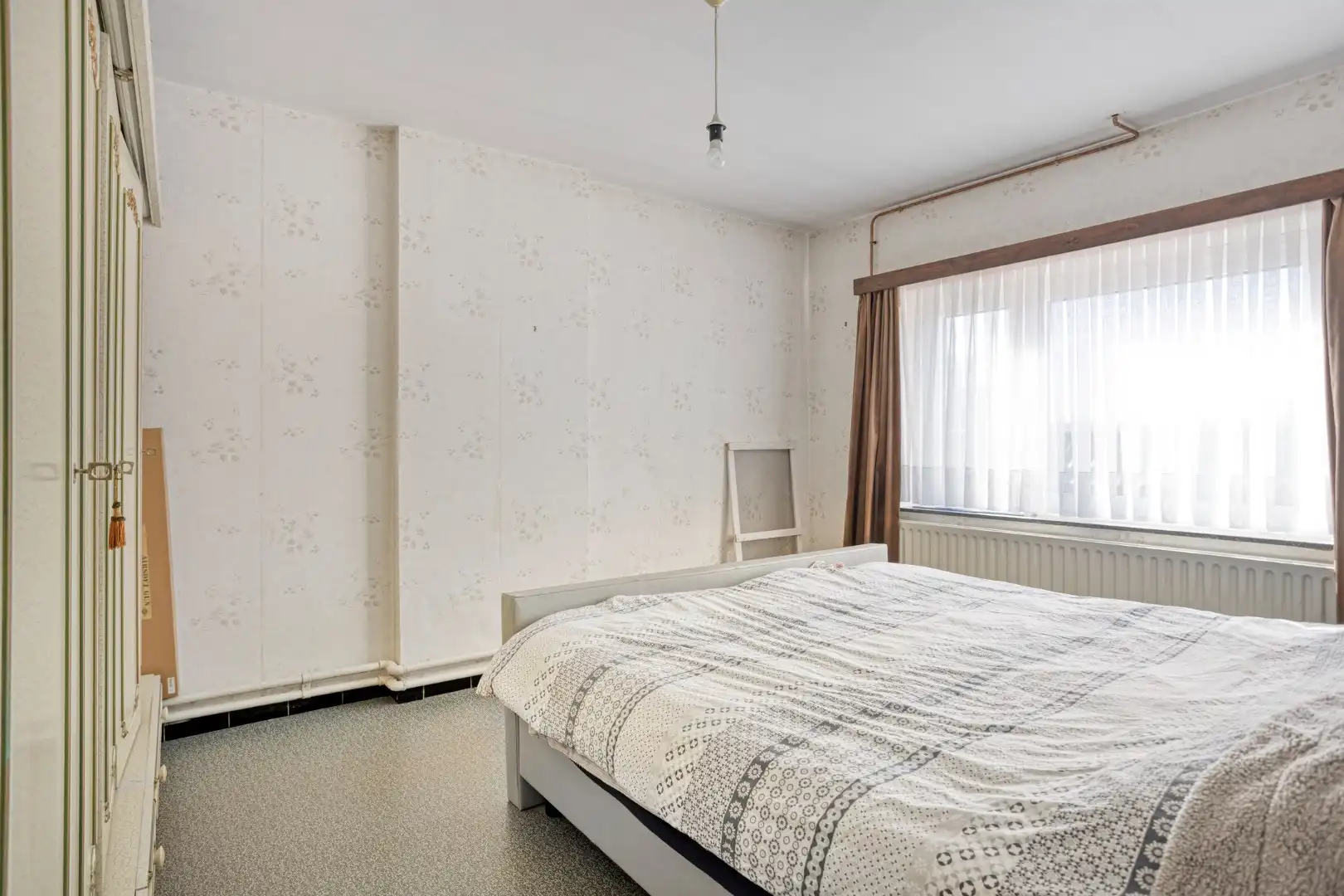 Woning met diepe tuin, garage en vernieuwd geïsoleerd dak, centrum Borgloon foto 15