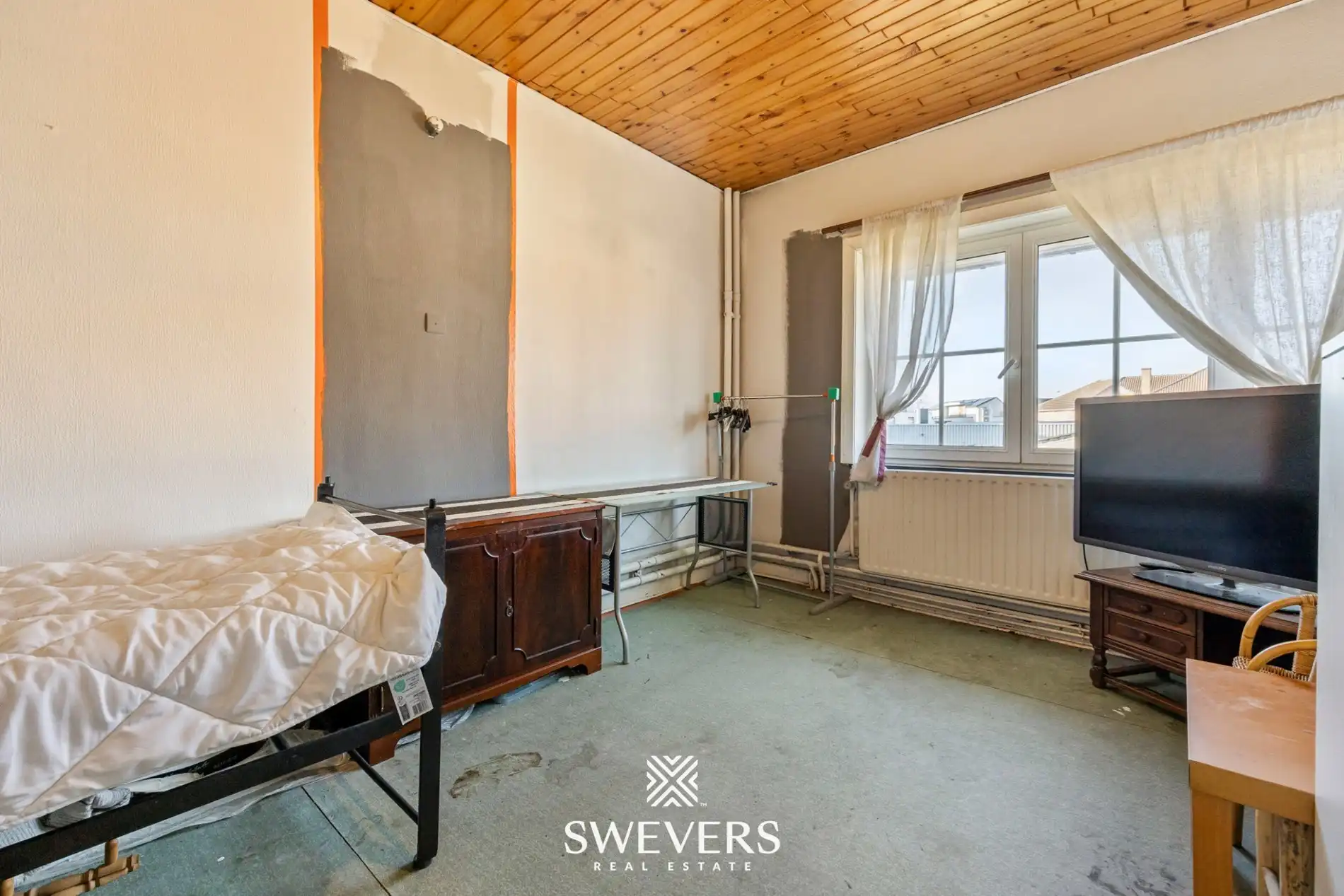 Te renoveren open bebouwing met ruime volumes en zuidgericht perceel in Heusden   foto 17