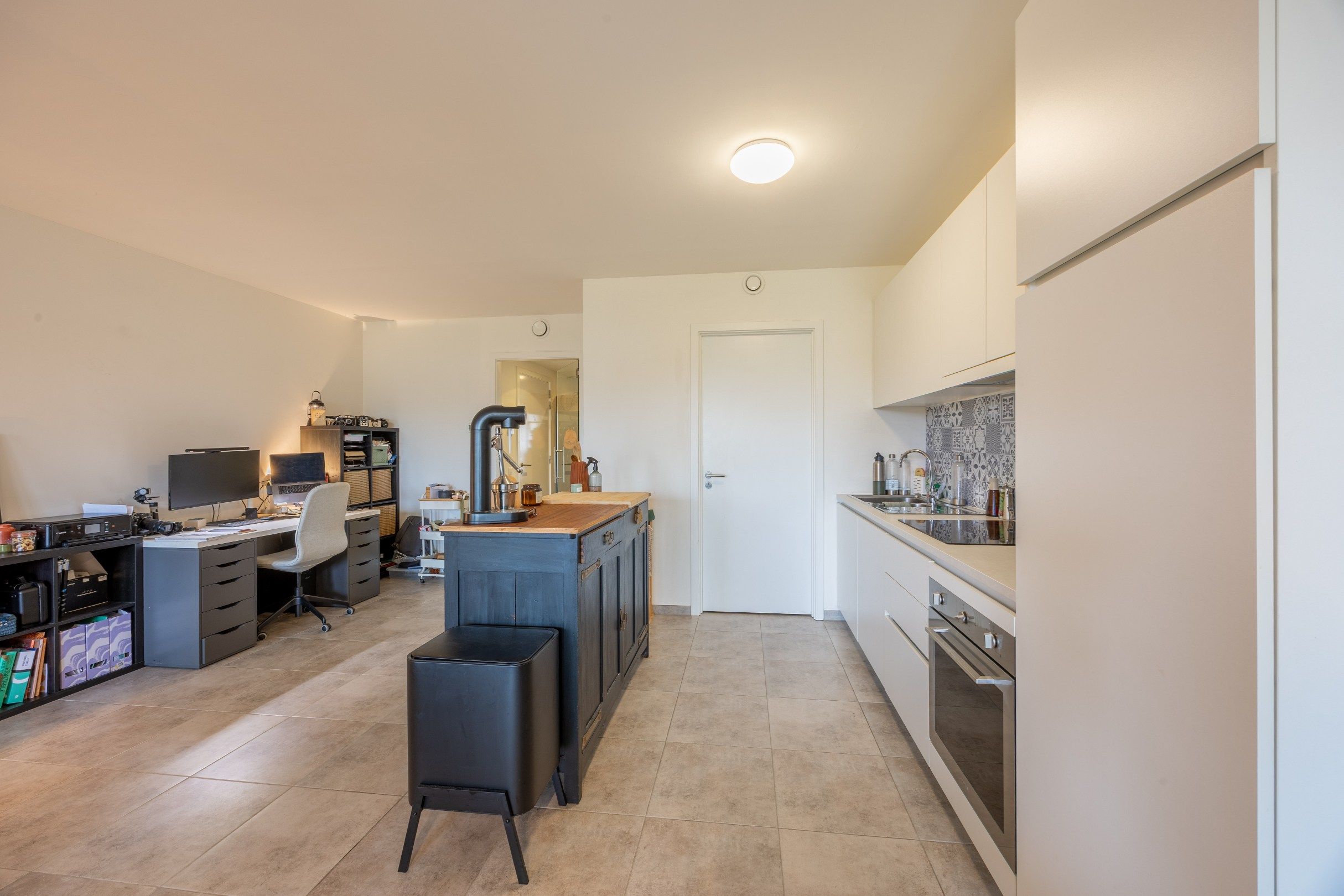 Gelijkvloers appartement met tuintje & staanplaats! foto 9