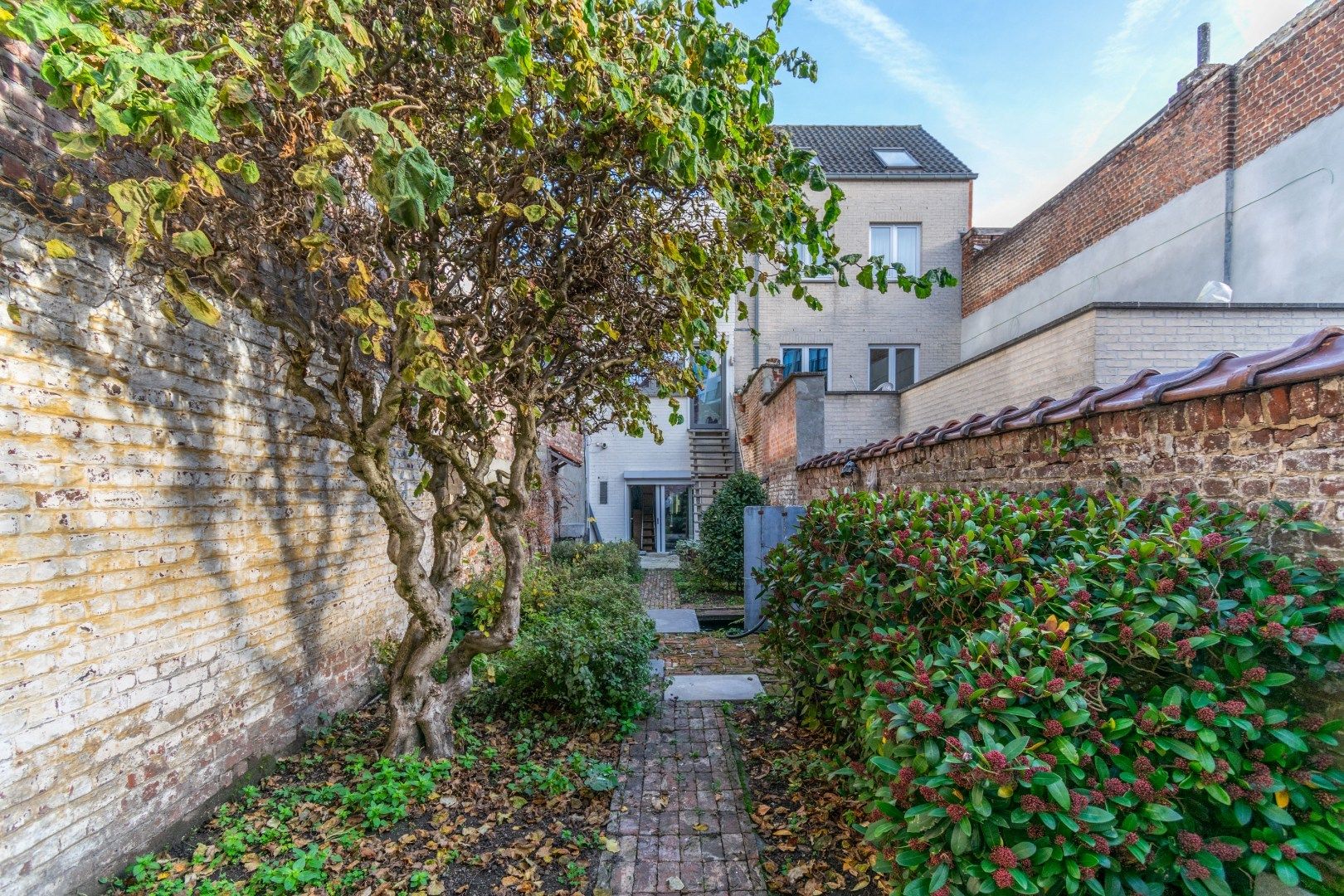 Karaktervol hoogwaardig afgewerkt gebouw met winkelruimte en woonst  foto 16