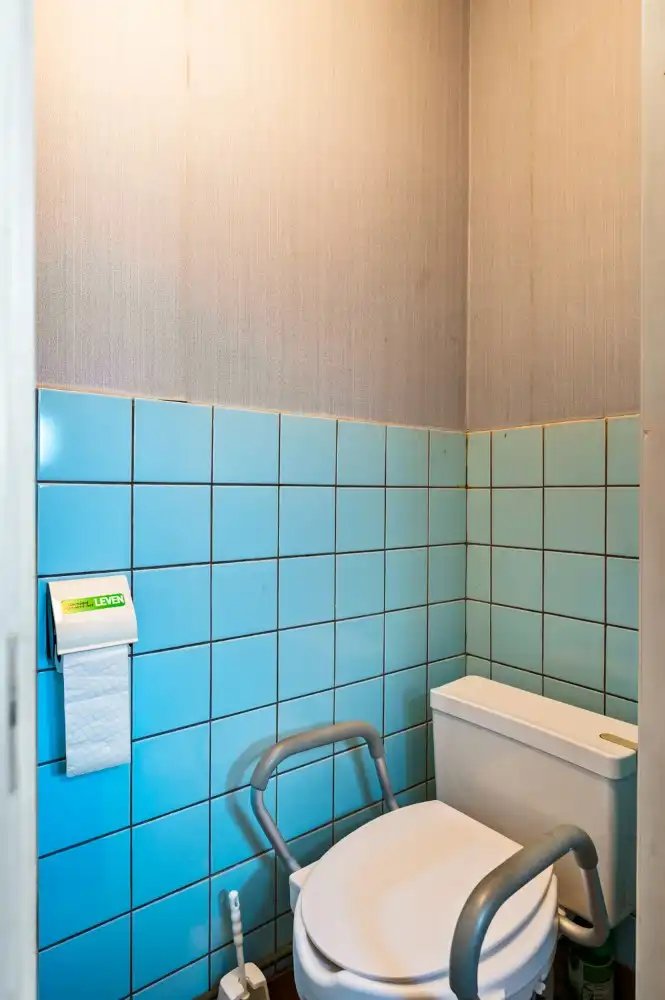 Te renoveren woning met 3 slpk., garage en tuintje foto 13