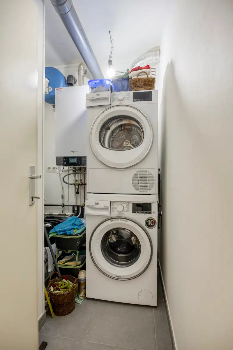 Gelijkvloers appartement met 2 kamers, tuin en garage foto 15