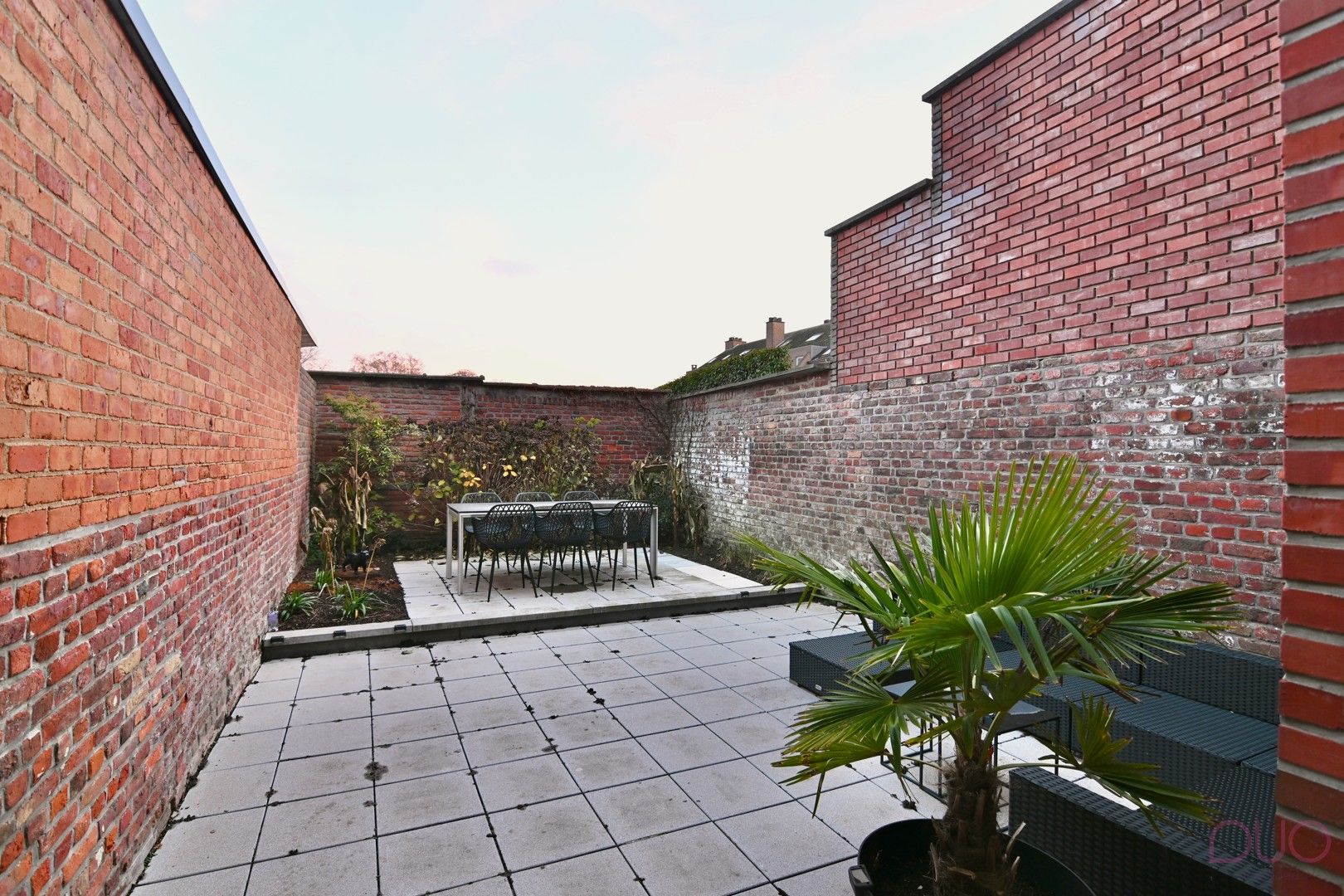 Instapklare woning in hartje Sint-Truiden met gezellige stadstuin en garage foto 24