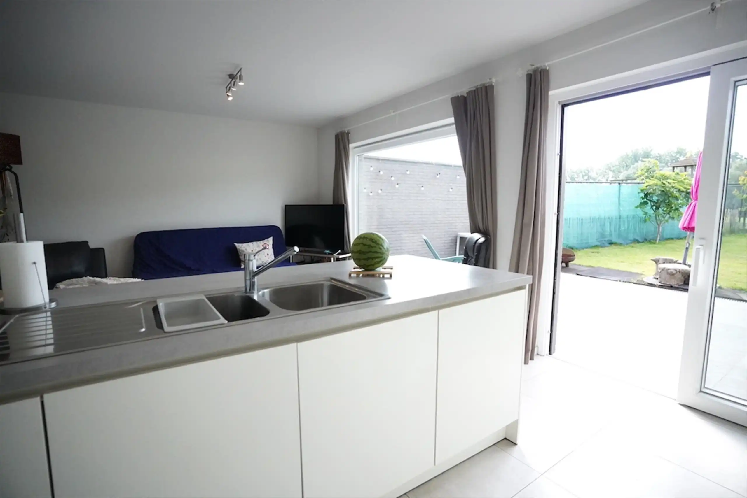 Jonge, verzorgde gezinswoning met tuin en garage foto 12