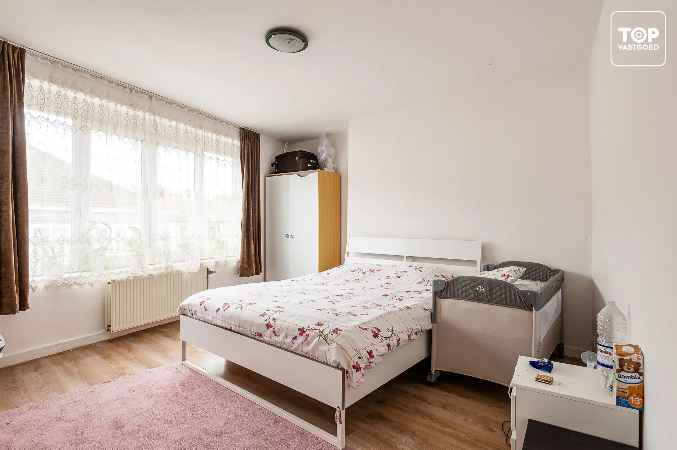 DISCREET Centraal gelegen (opbrengst) eigendom met verhuurd handelsgelijkvloers en 2-slaapkamer woonst foto 24