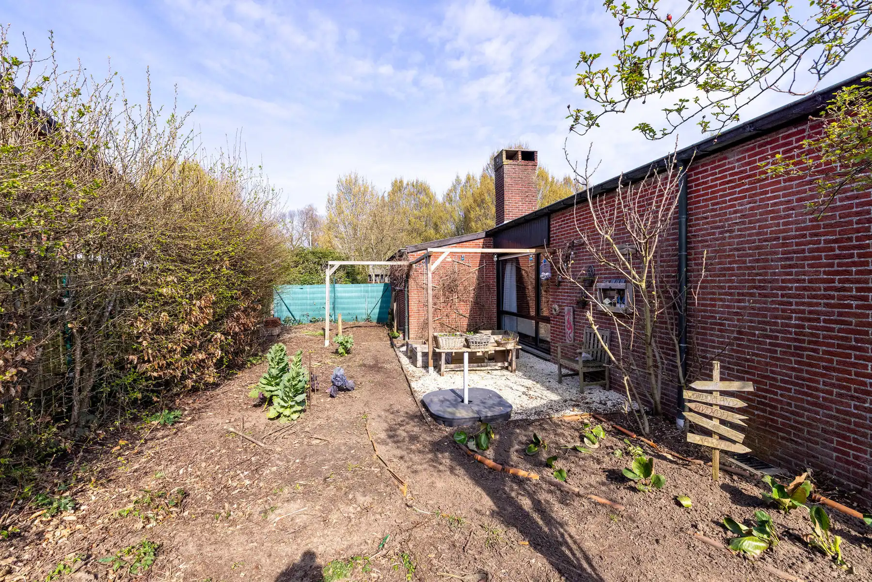 Laagbouwwoning met 2/3slpk, tuin en garage foto 25