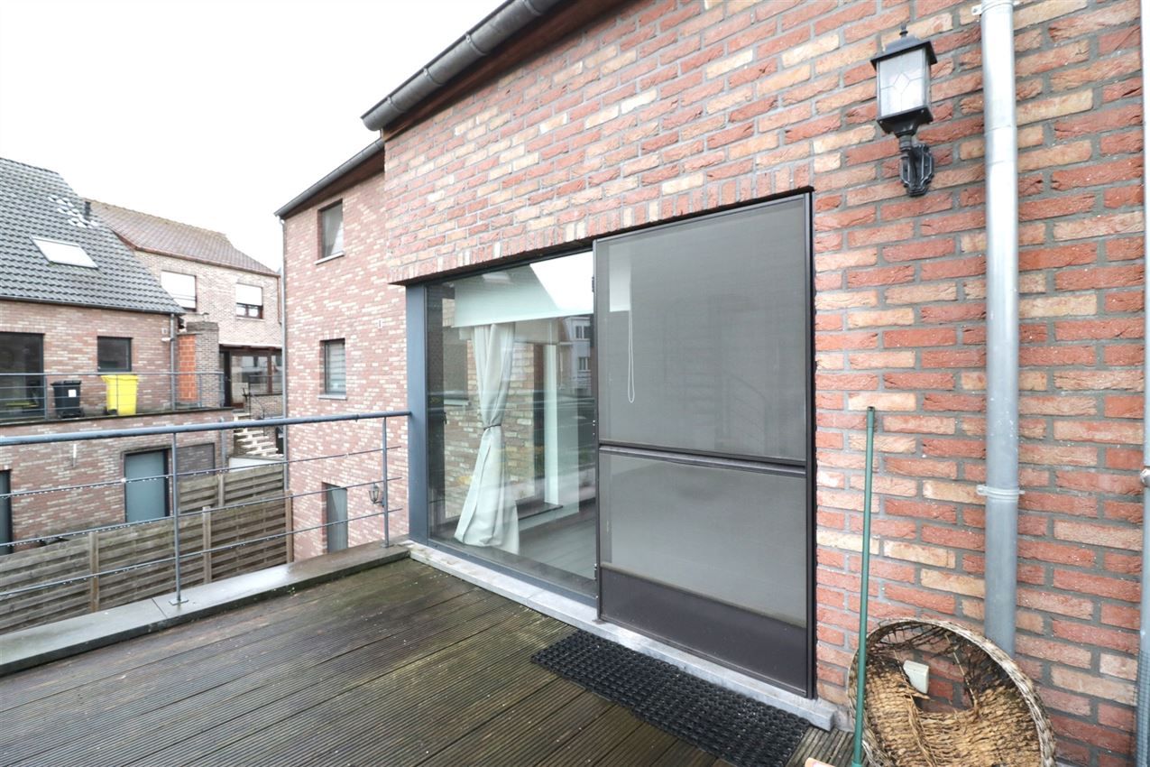 Duplex-appartement met 2 slpk., terras, autostaanplaats in centrum foto 7