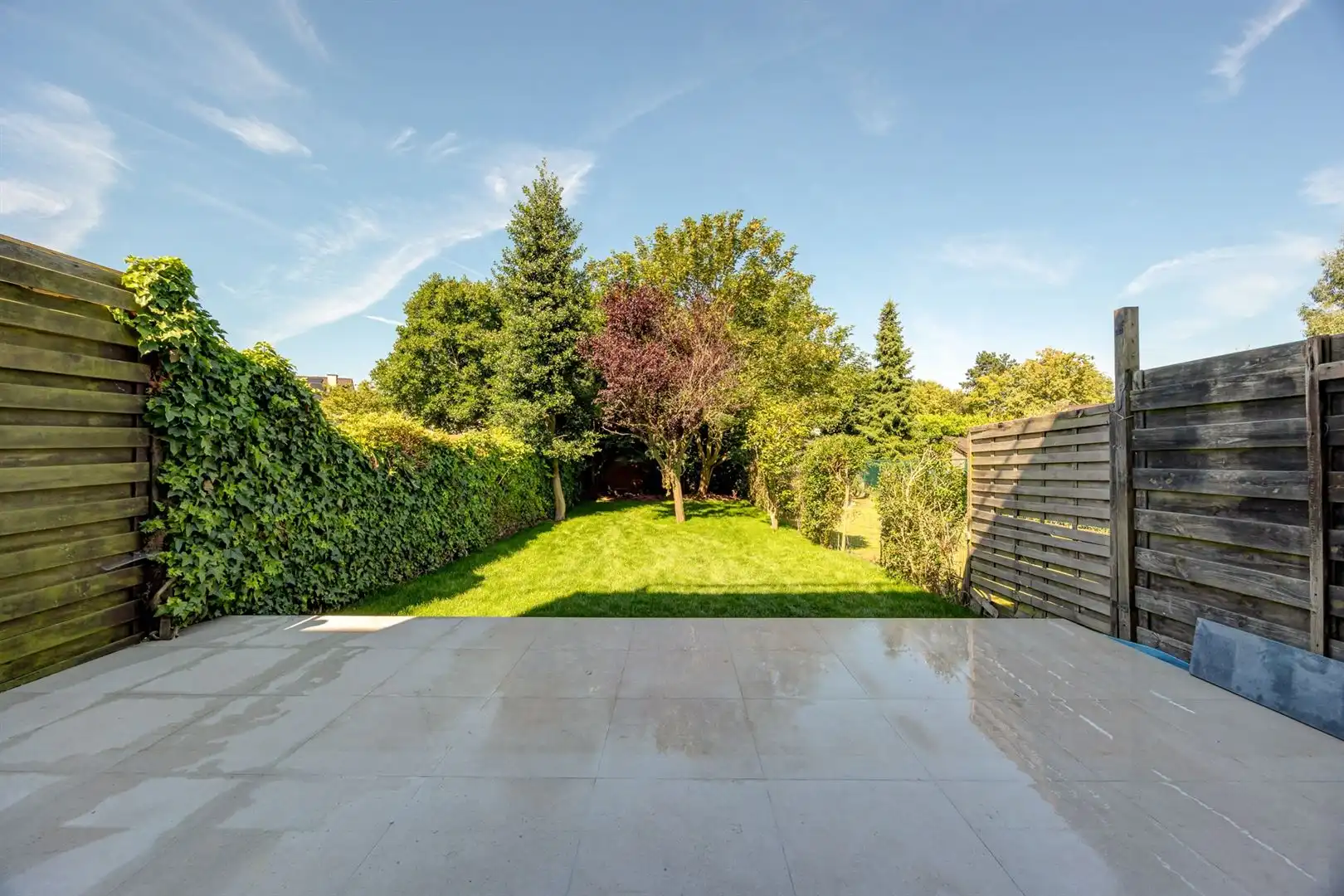 Gerenoveerd gelijkvloers met zonnige tuin foto 3