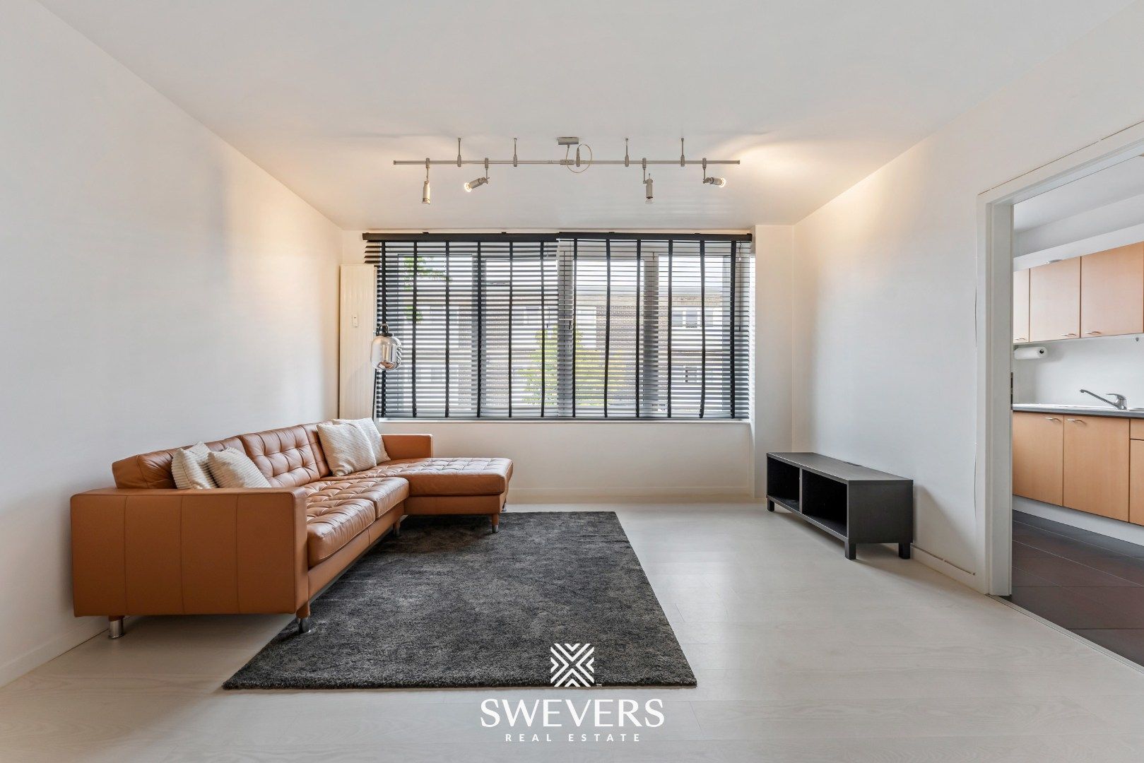 Instapklaar en energiezuinig 2-slaapkamerappartement in het centrum van Heppen foto 5