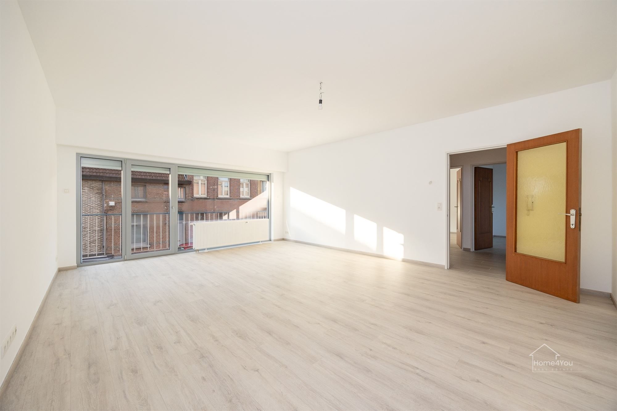 Vernieuwd en zonnig 2 slaapkamer appartement foto 4