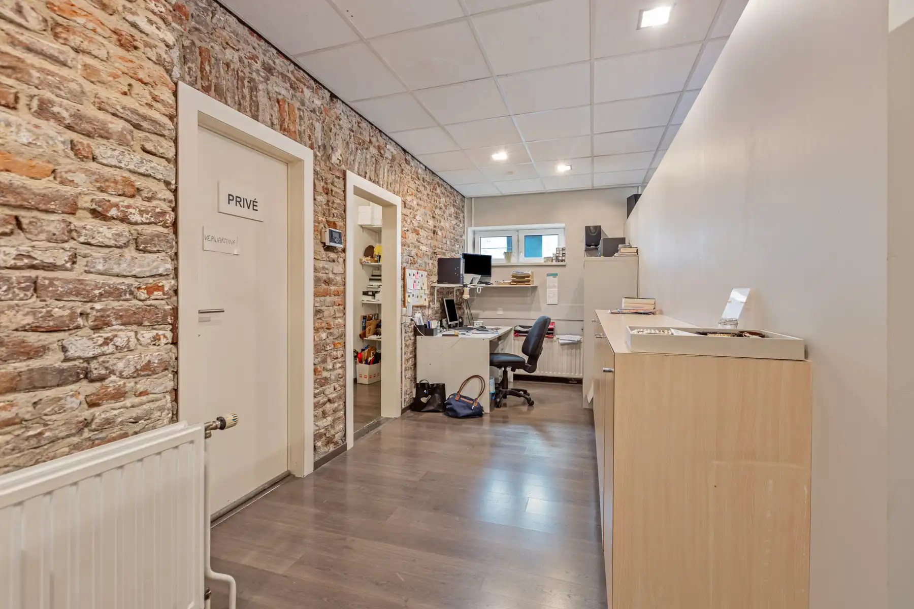 Handelszaak en ruime woning (4 slpk.) in hartje Maaseik.  foto 7