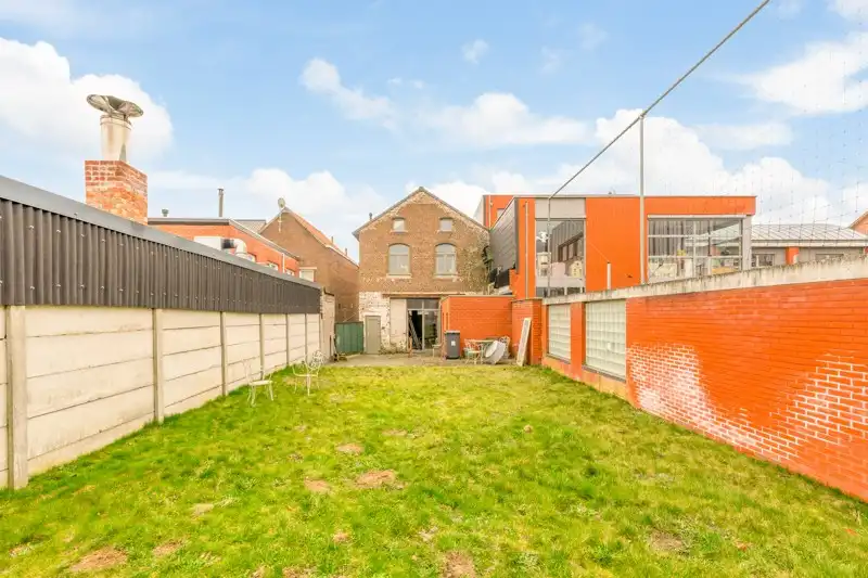 Handelsruimte met woonappartement in het centrum van Wommersom foto 33