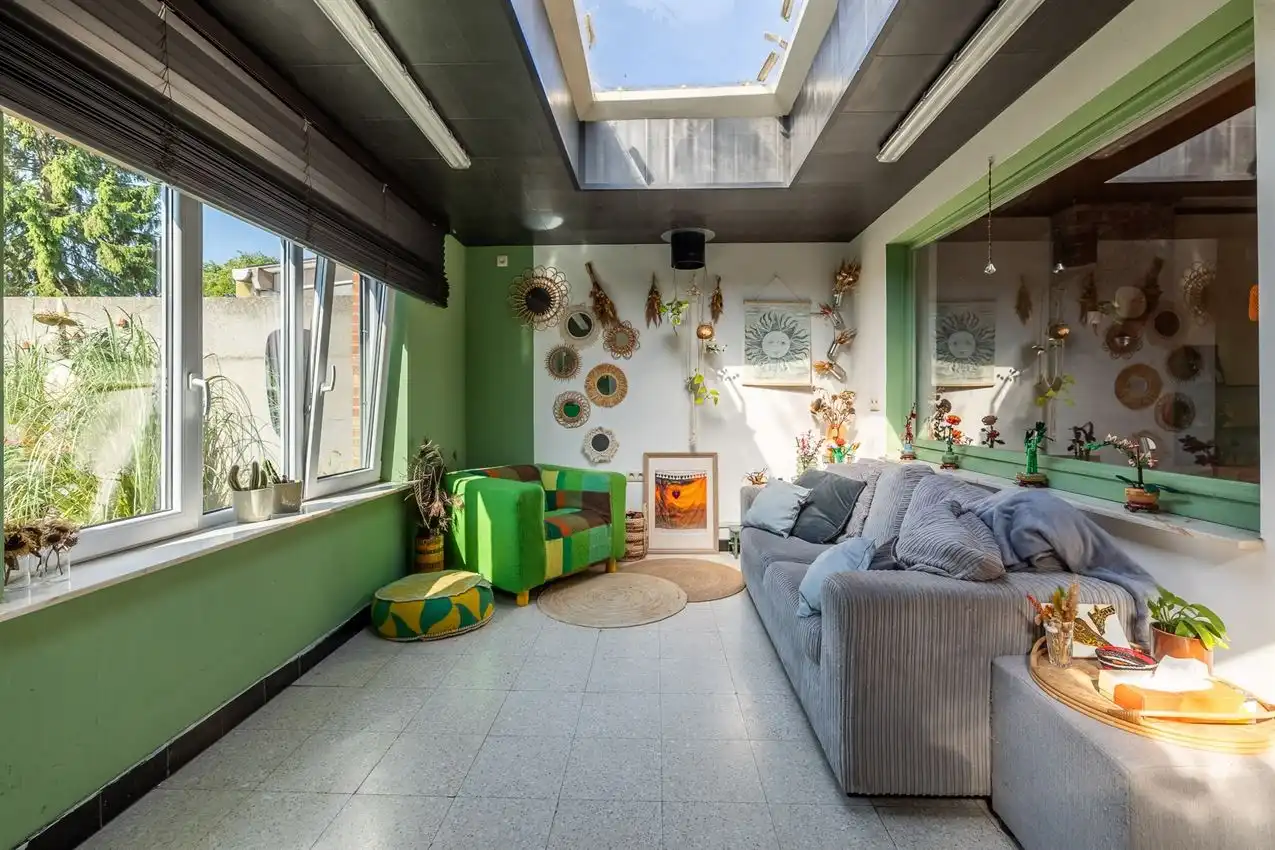 Ruime retrowoning met EPC C,  zuidtuin en achterliggende toegang. foto 13
