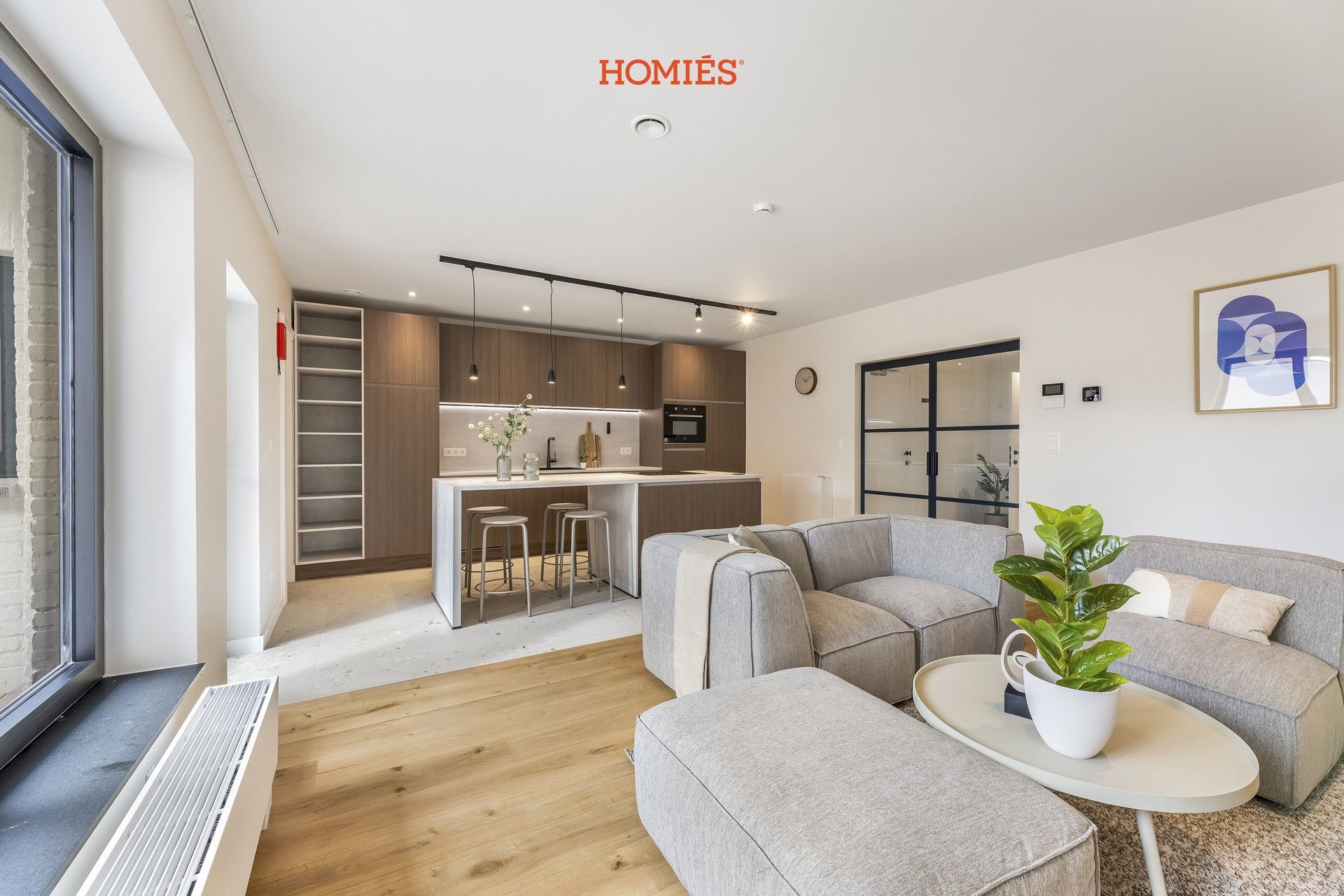 Luxueus en energiezuinig gelijkvloersappartement met stadskoer foto {{pictureIndex}}