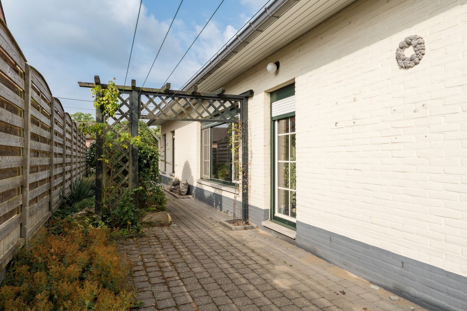 Instapklare gezinswoning met veranda en prachtige tuin foto 34