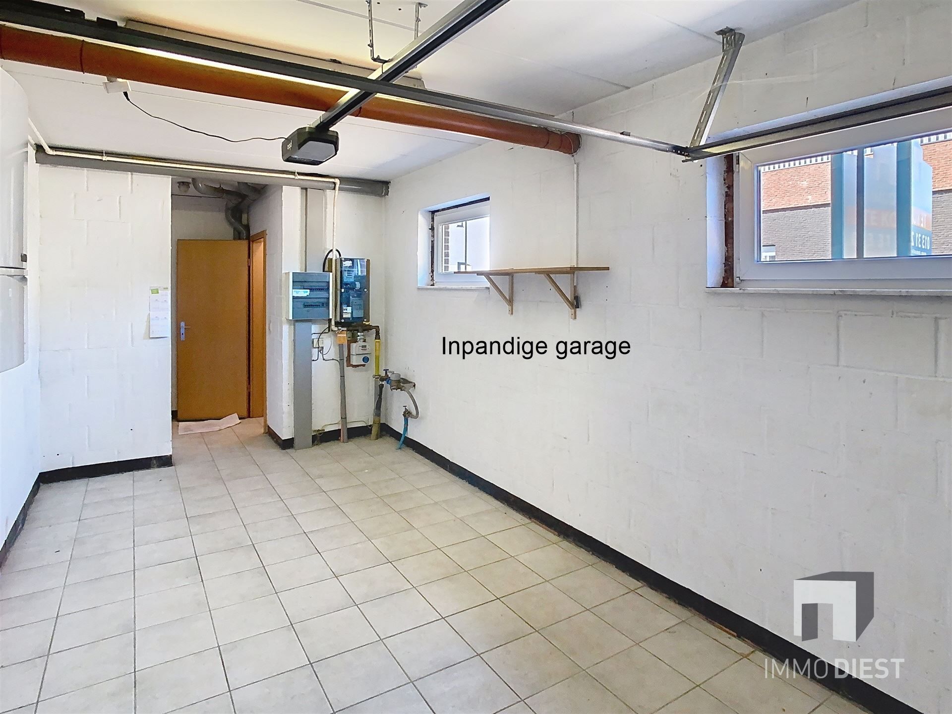 Triplex met 2 slaapkamers en inpandige garage foto 19