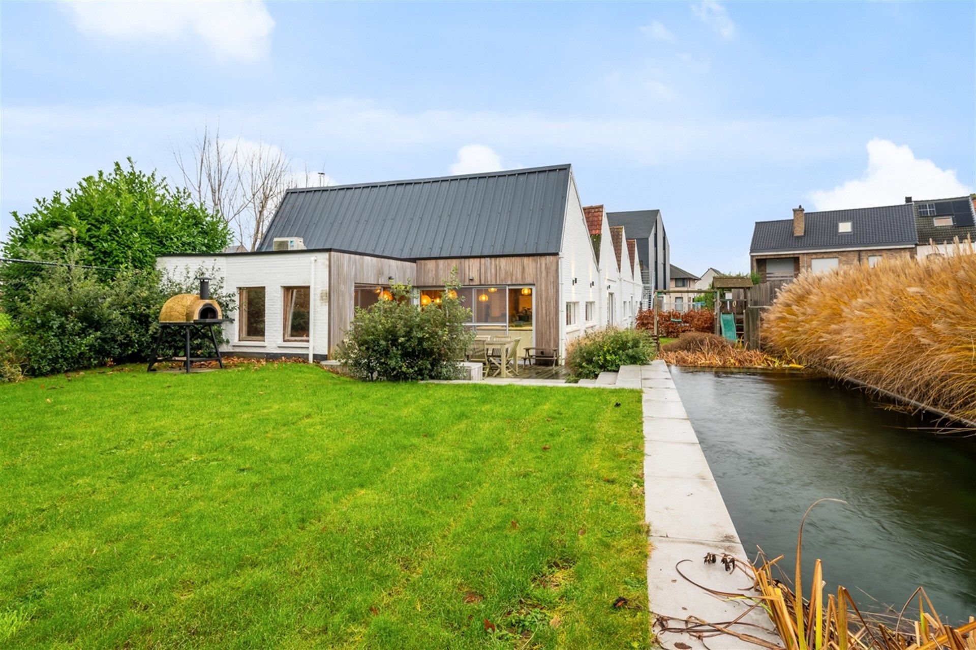 Veelzijdig gebouw bestaande uit woonst met 4 slpks, tuinloft met 1 slpk en handelspand/kantoorruimte foto 30