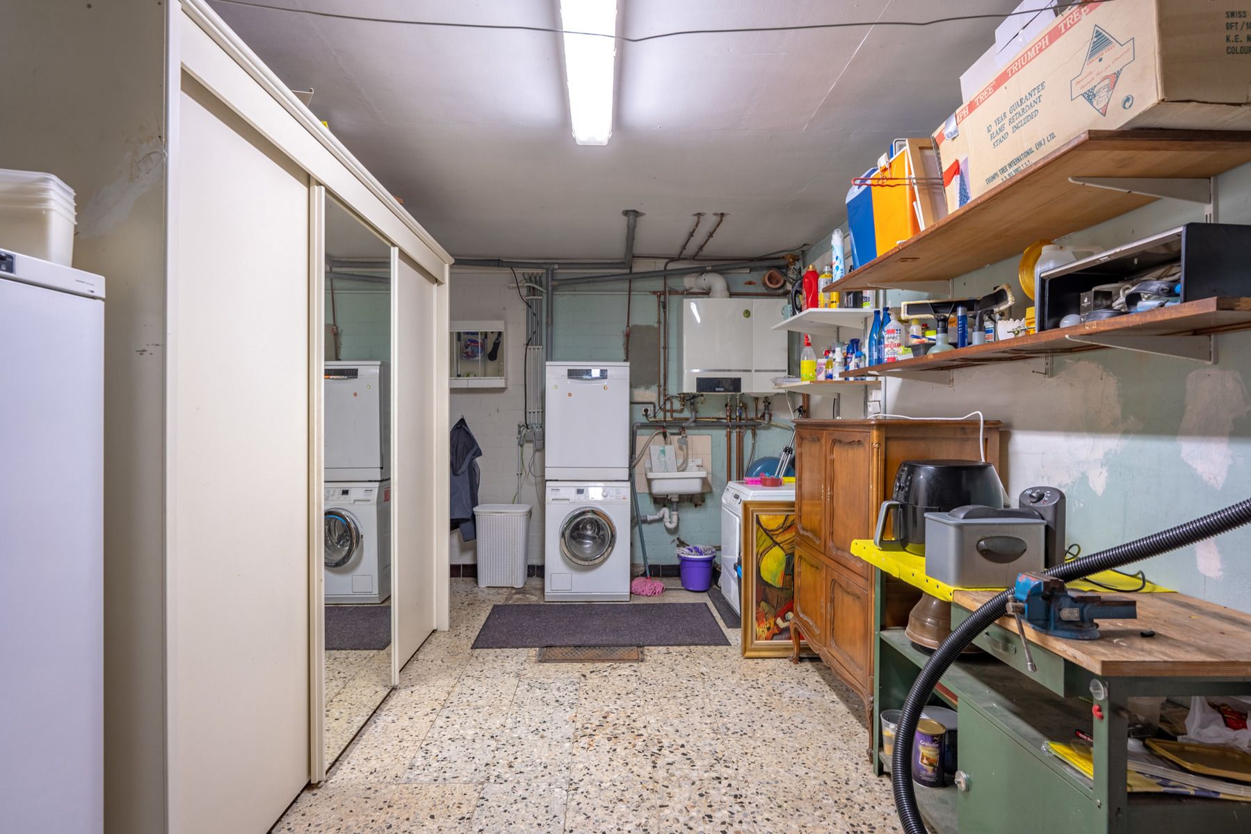 Instapklare woning met 5 slaapkamers, tuin, inpandige garage én dubbele garagebox foto 10