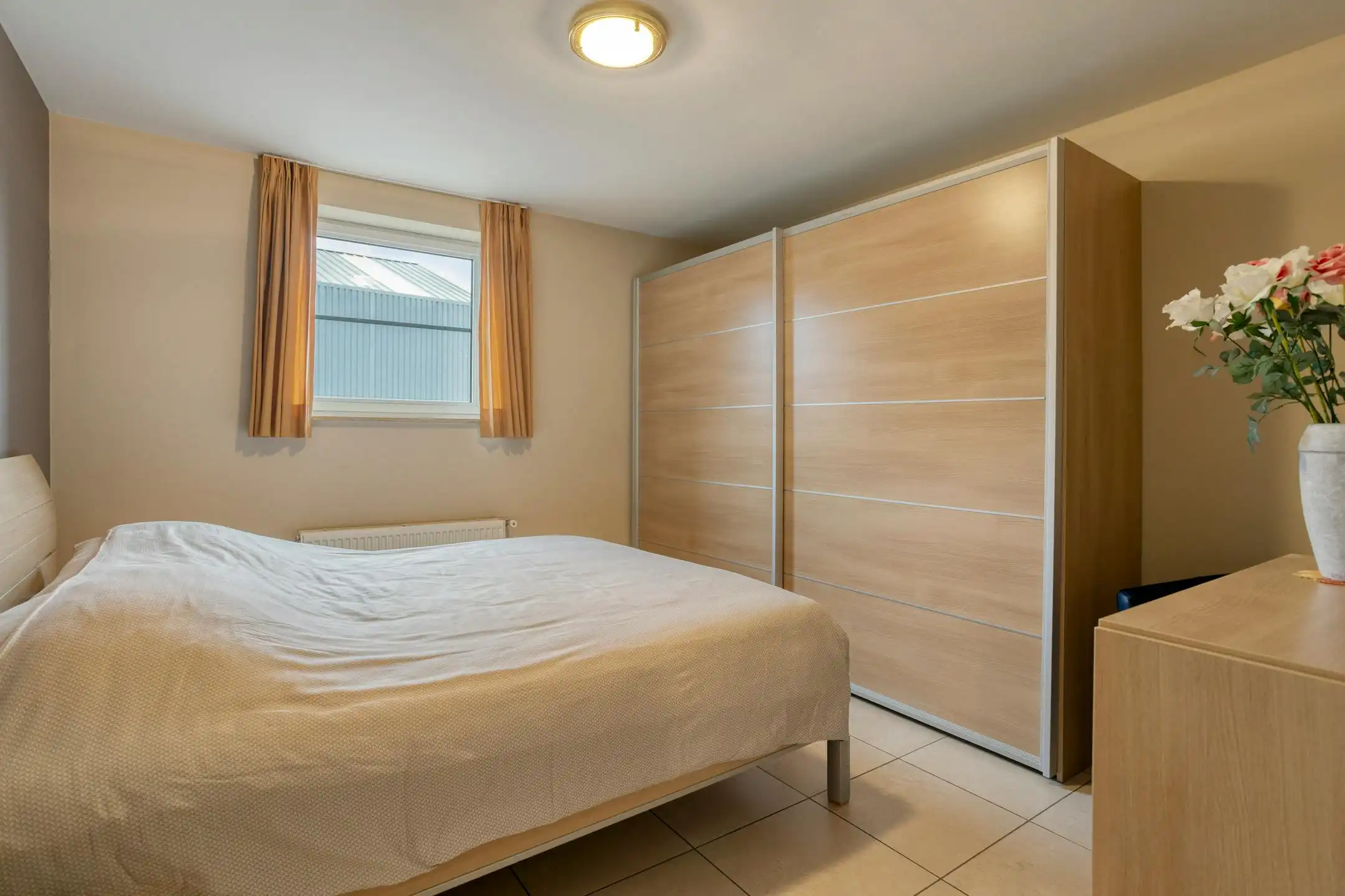 Lichtrijk 2-slaapkamer appartement met garage te koop in Kuurne! foto 14