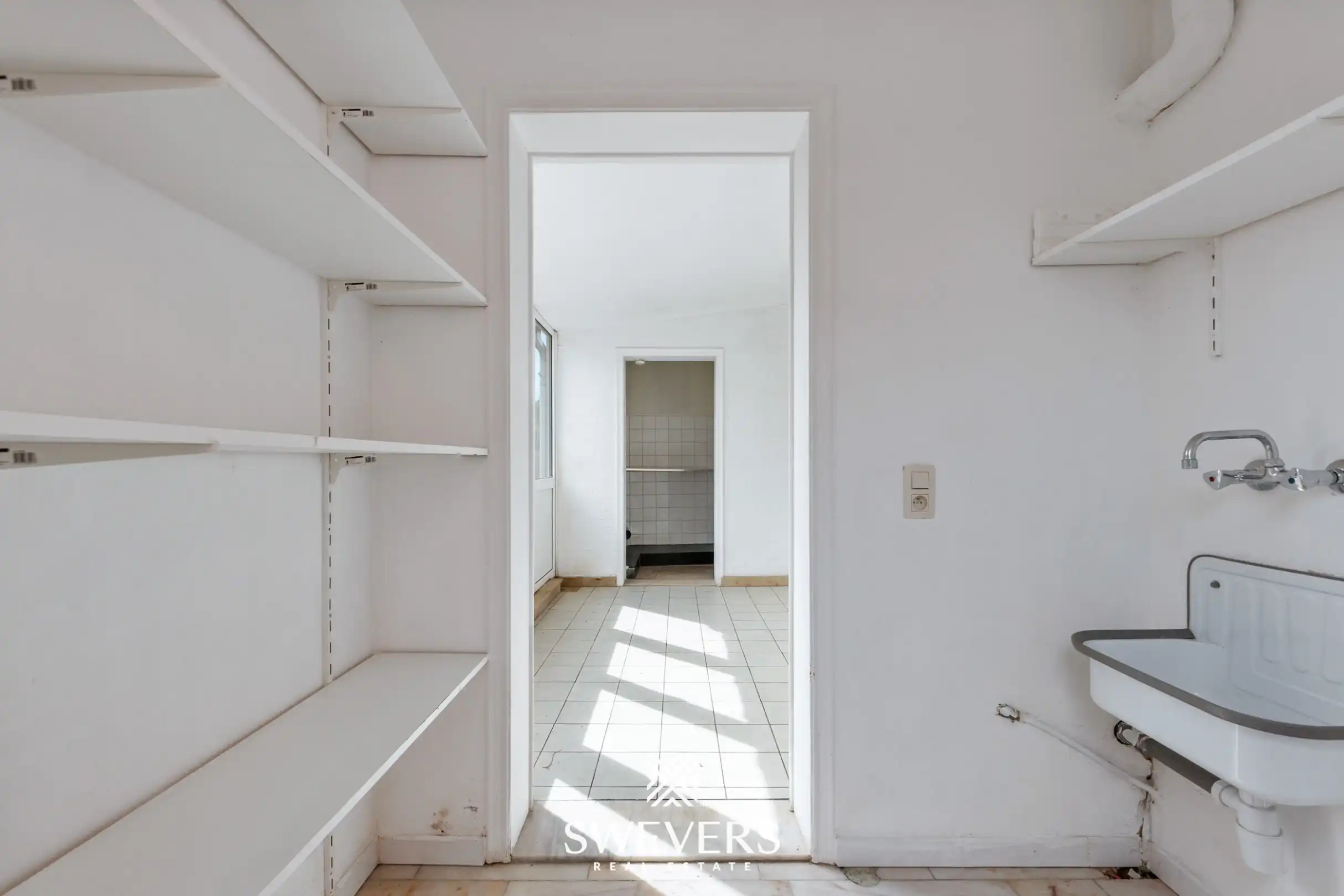 Veelzijdig handelspand met ruim duplex appartement: wonen, ondernemen én investeren onder één dak in centrum Alken foto 24