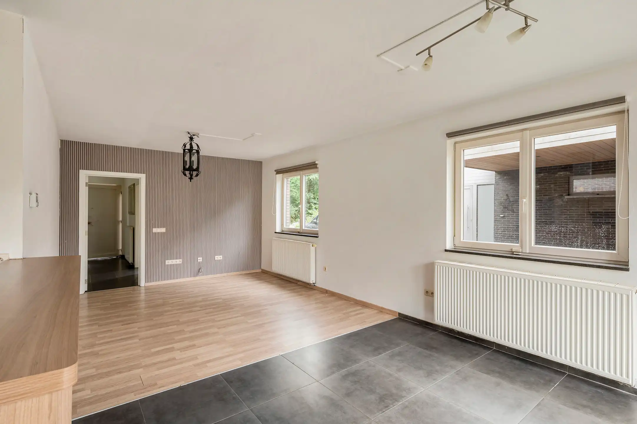 Ruime en lichtrijke gezinswoning met 3 slaapkamers, dressing bureau en aangename tuin foto 11