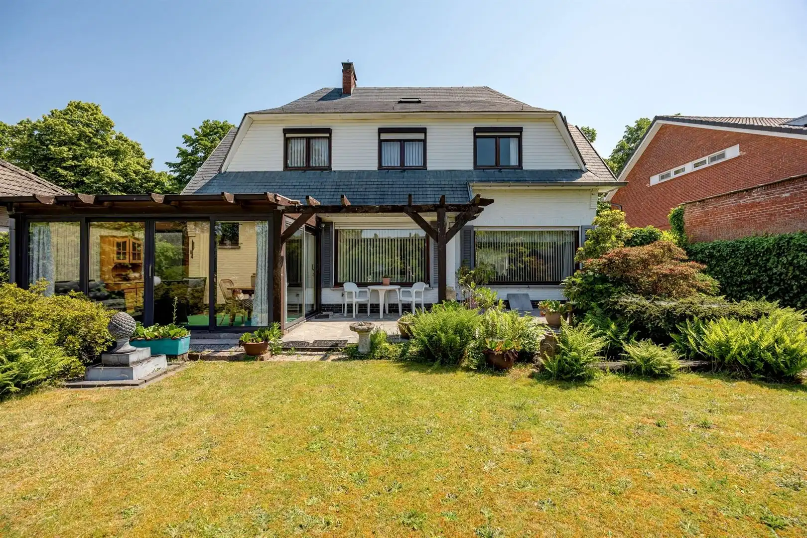 Karaktervolle villa op prachtig perceel van 1.063 m² in residentieel Schoten foto 4