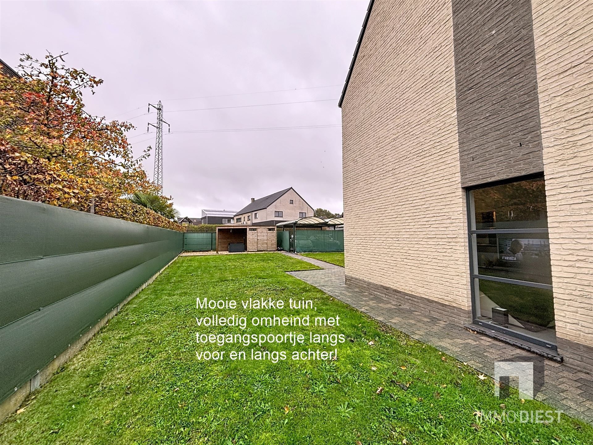 Energiezuininge woning met 3slpk - 2 carports - 5,41are  foto 2