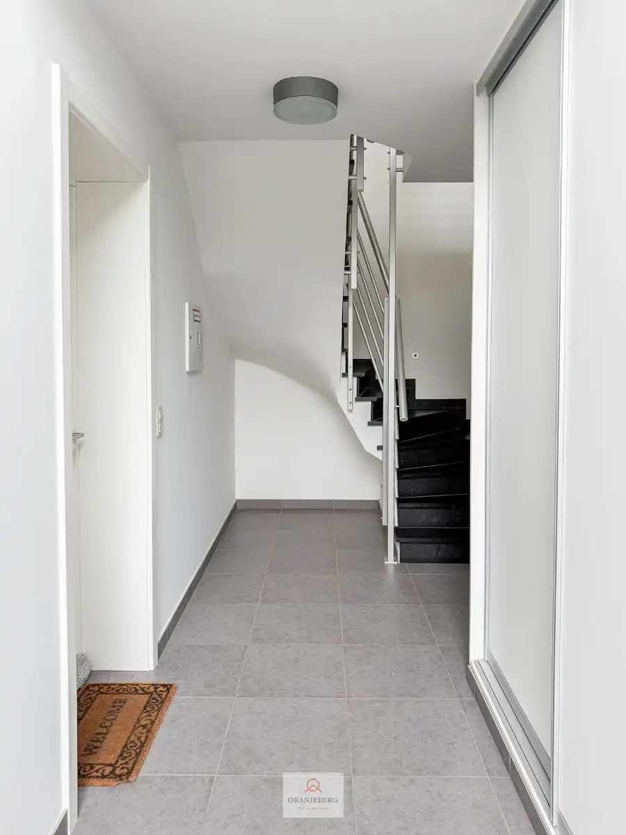 Gelijkvloers 2 slaapkamerappartement met ruime tuin foto 26