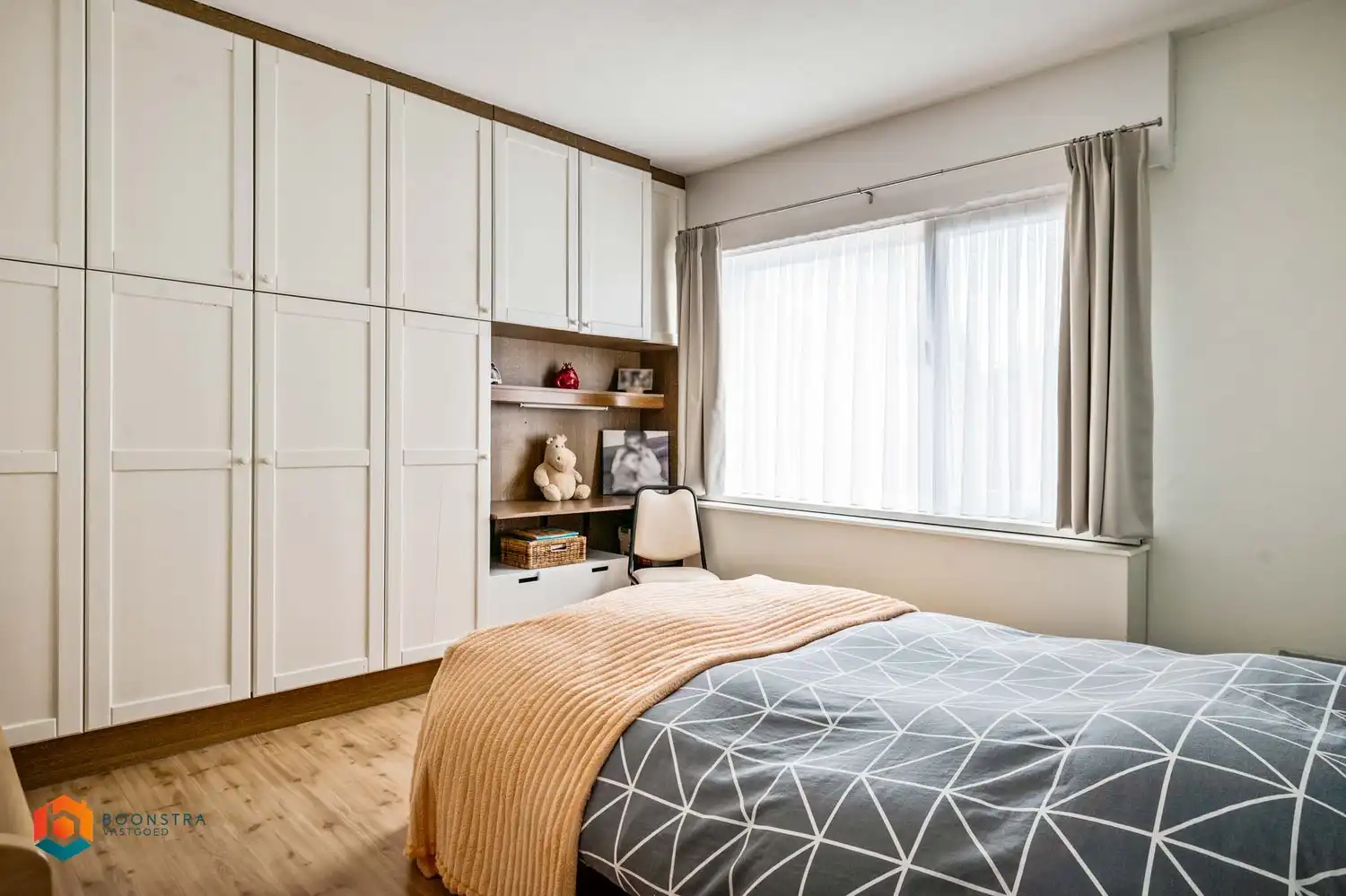 Zeer verzorgde laagbouwwoning met 2 slpkrs en leuke tuin foto 12