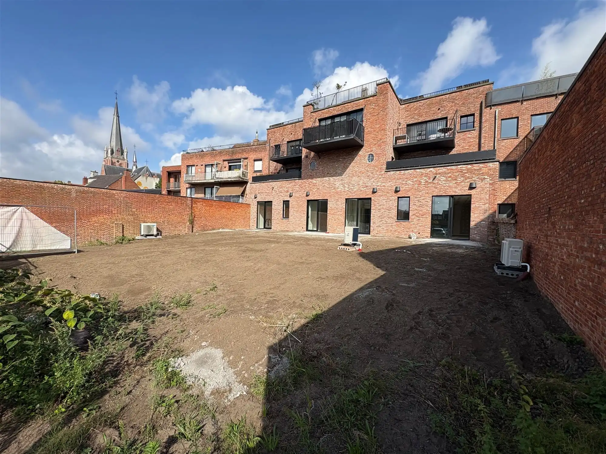 Nieuwbouwappartement met 2 slaapkamers en grote tuin. foto 5