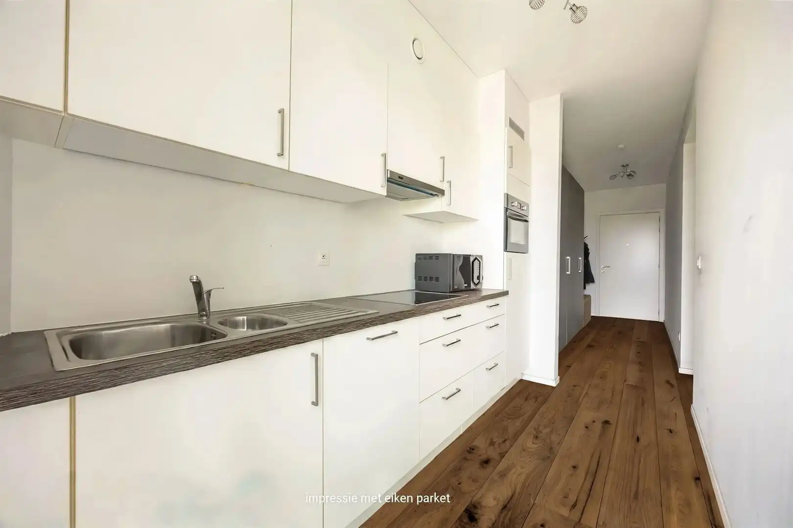 Lichtrijk appartement met groenzicht, parking en groot terras foto 9